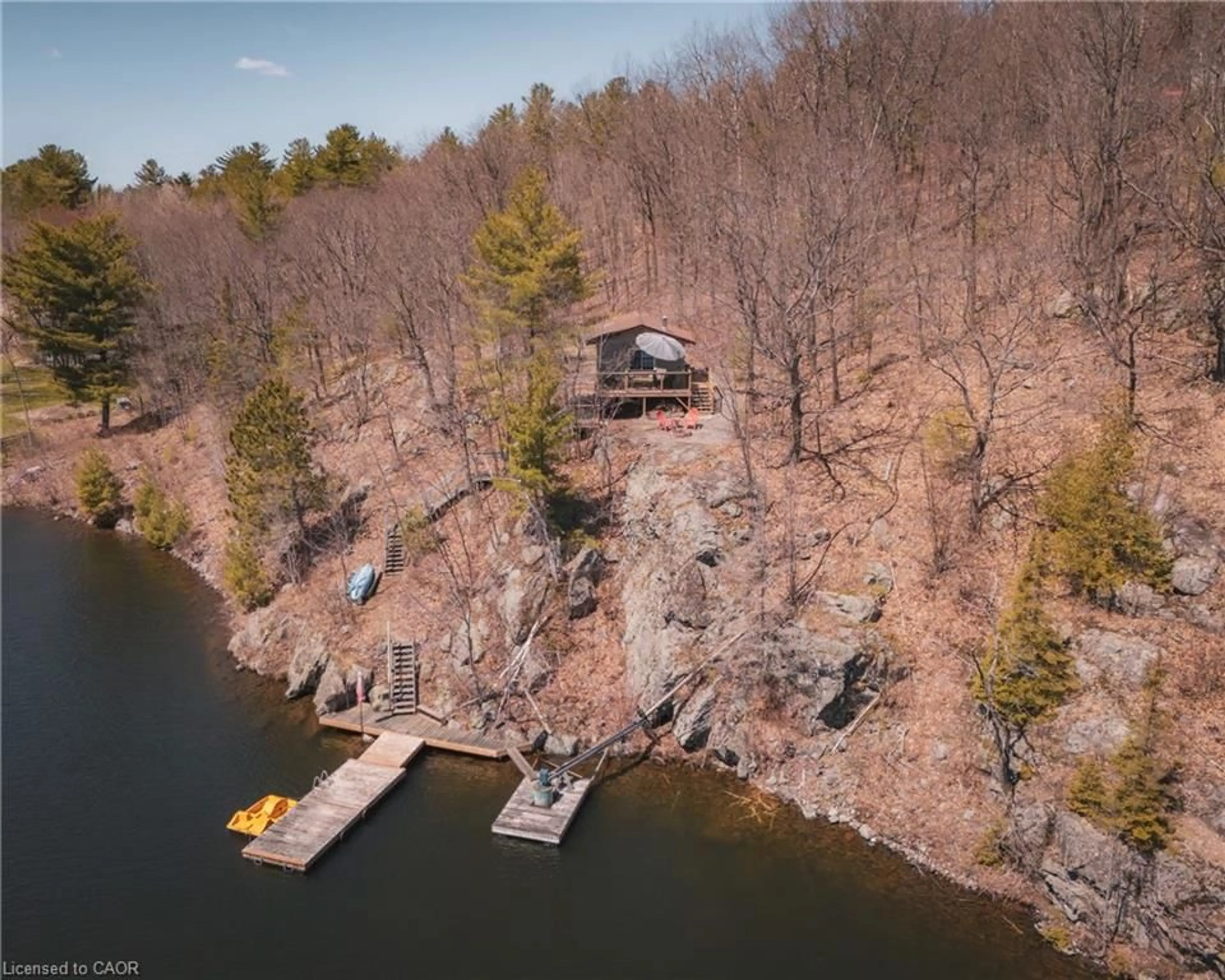 A pic from outside/outdoor area/front of a property/back of a property/a pic from drone, water/lake/river/ocean view for 449 Clear Lake Dr, Espanola Ontario P5E 1N6