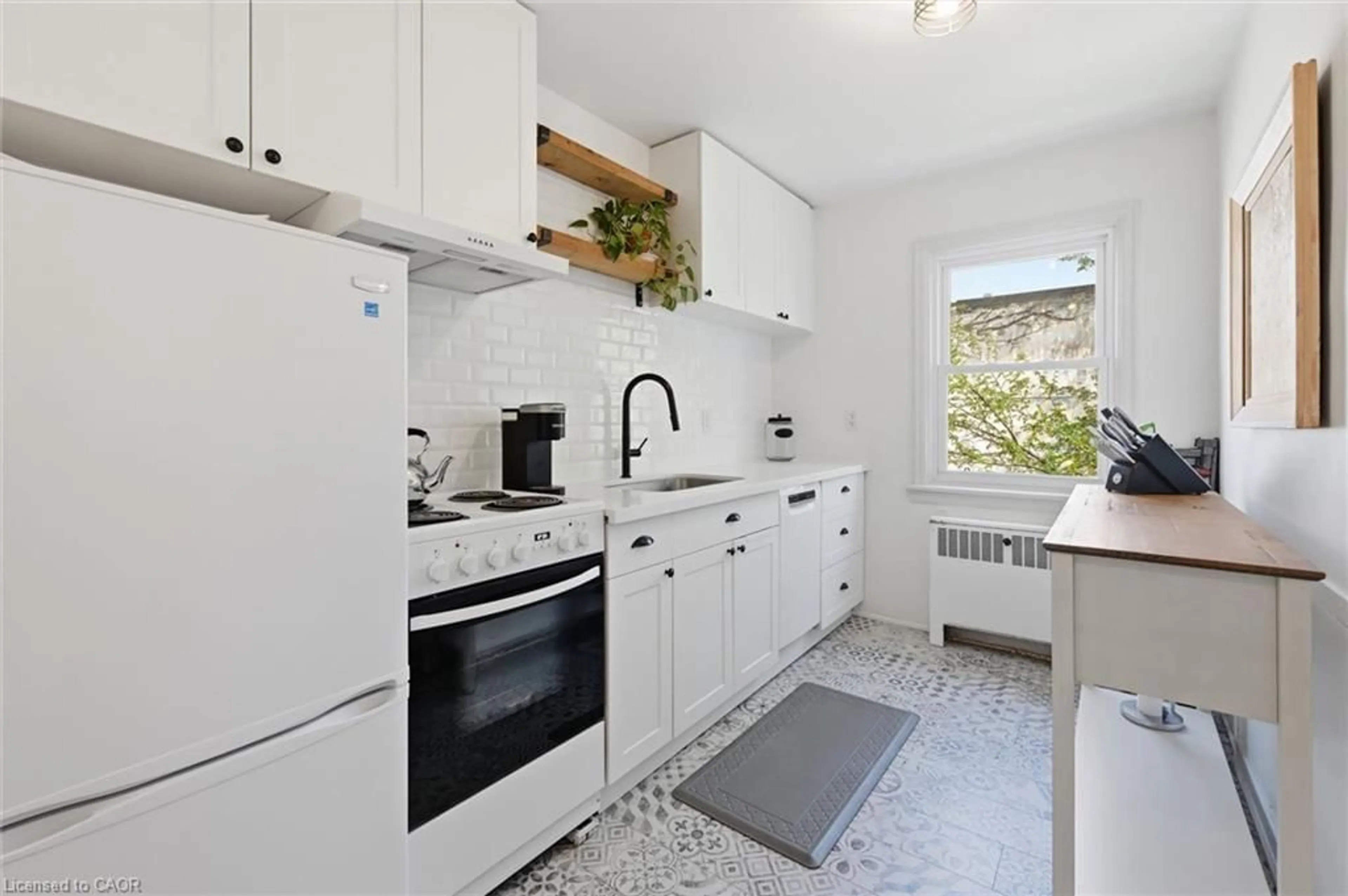 Standard kitchen, ceramic/tile floor for 137 Emerald St #28, Hamilton Ontario L8N 2V4