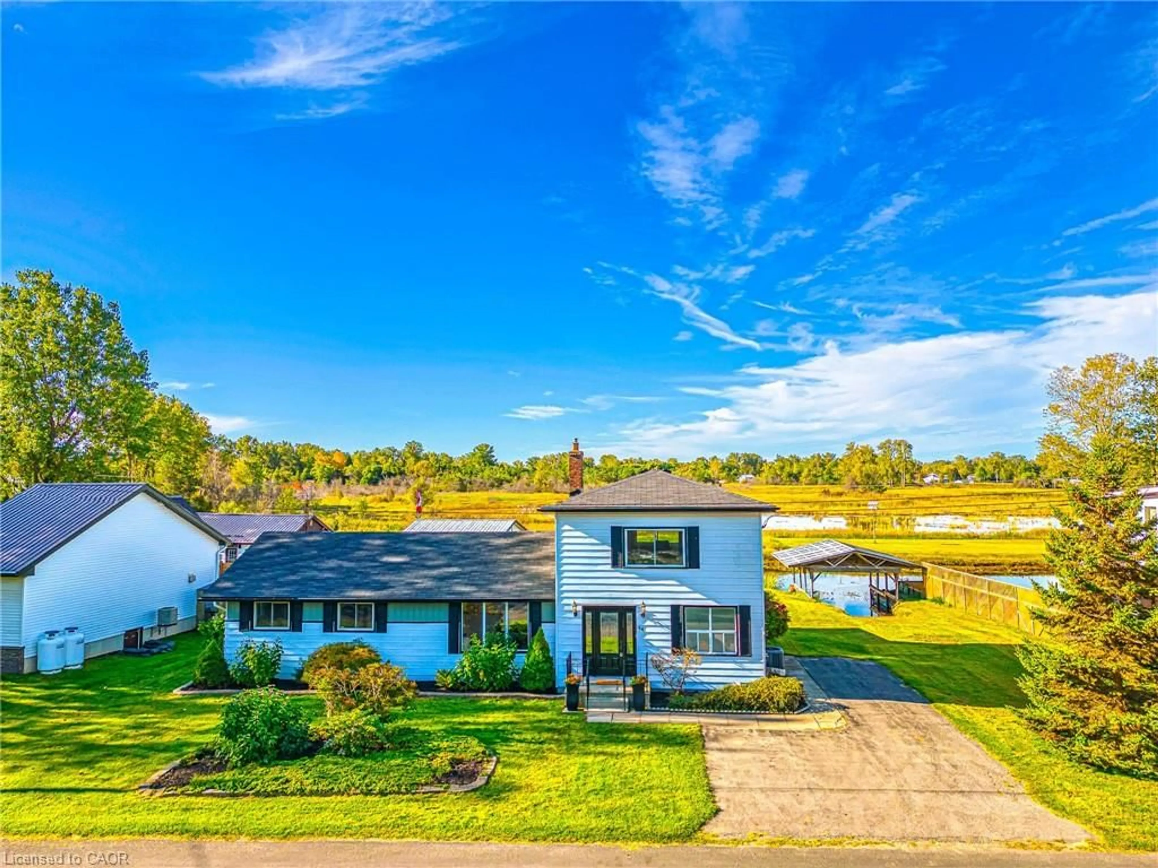A pic from outside/outdoor area/front of a property/back of a property/a pic from drone, water/lake/river/ocean view for 44 Old Cut Blvd, Port Rowan Ontario N0E 1M0
