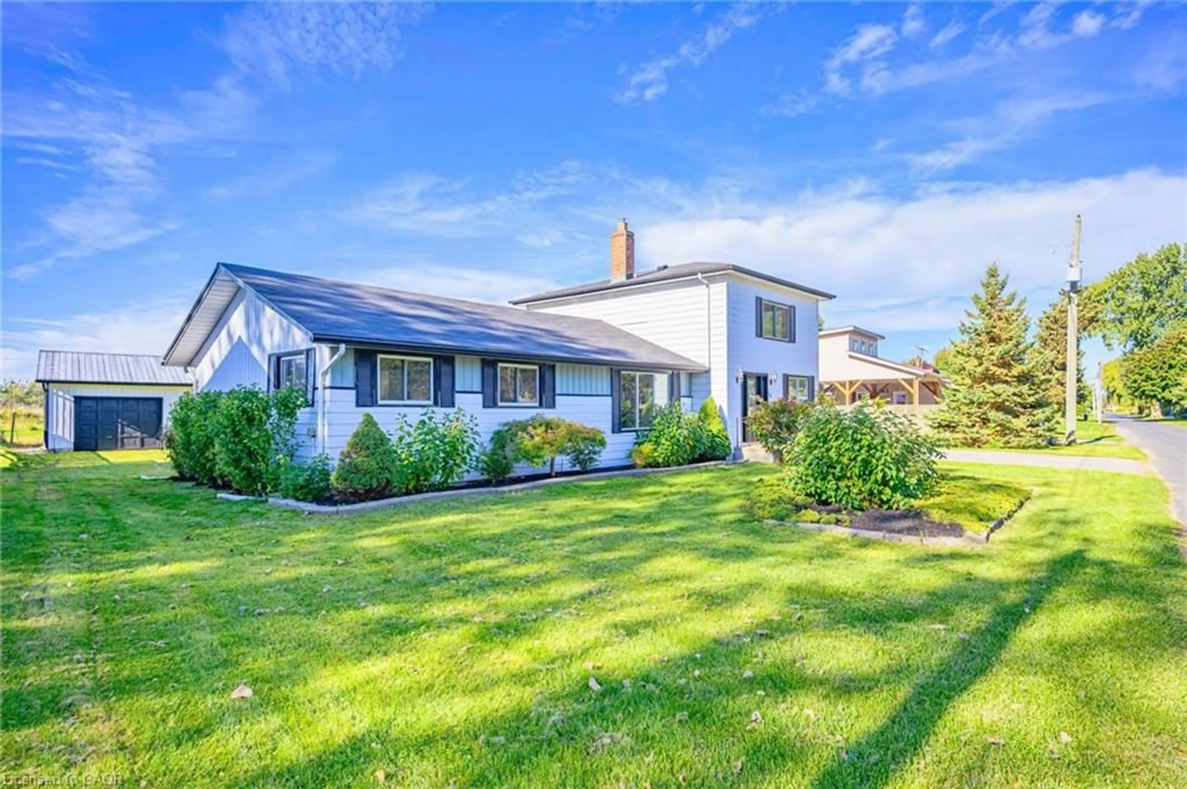 A pic from outside/outdoor area/front of a property/back of a property/a pic from drone, unknown for 44 Old Cut Blvd, Port Rowan Ontario N0E 1M0
