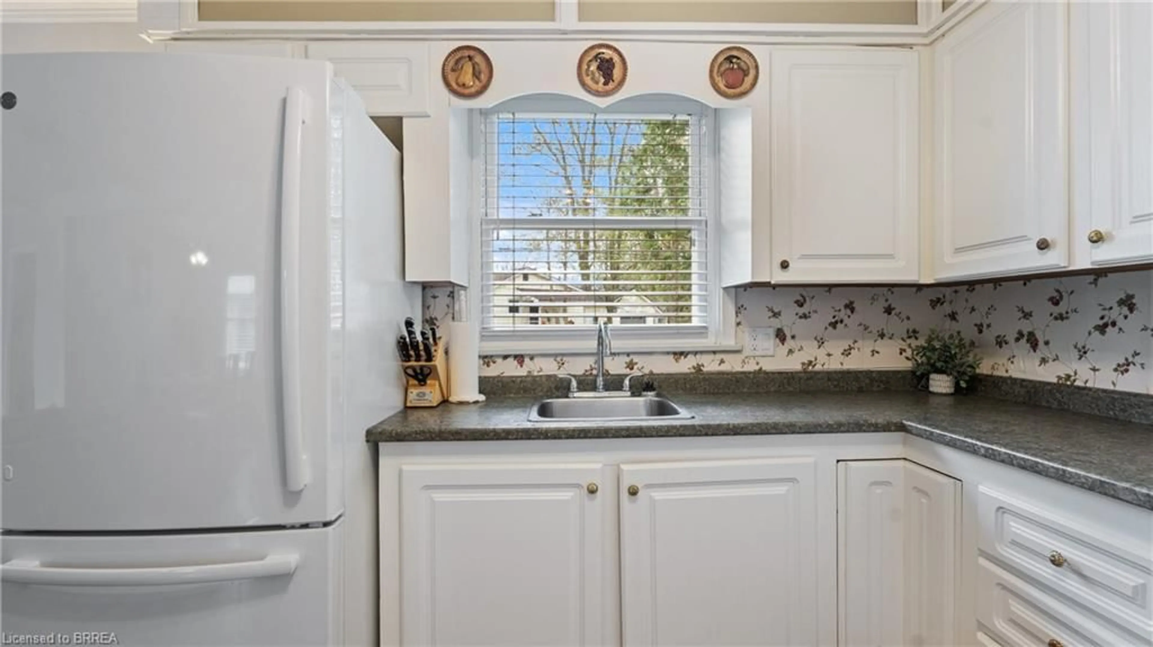 Standard kitchen, ceramic/tile floor for 303 Cedar Dr, Turkey Point Ontario N0E 1T0