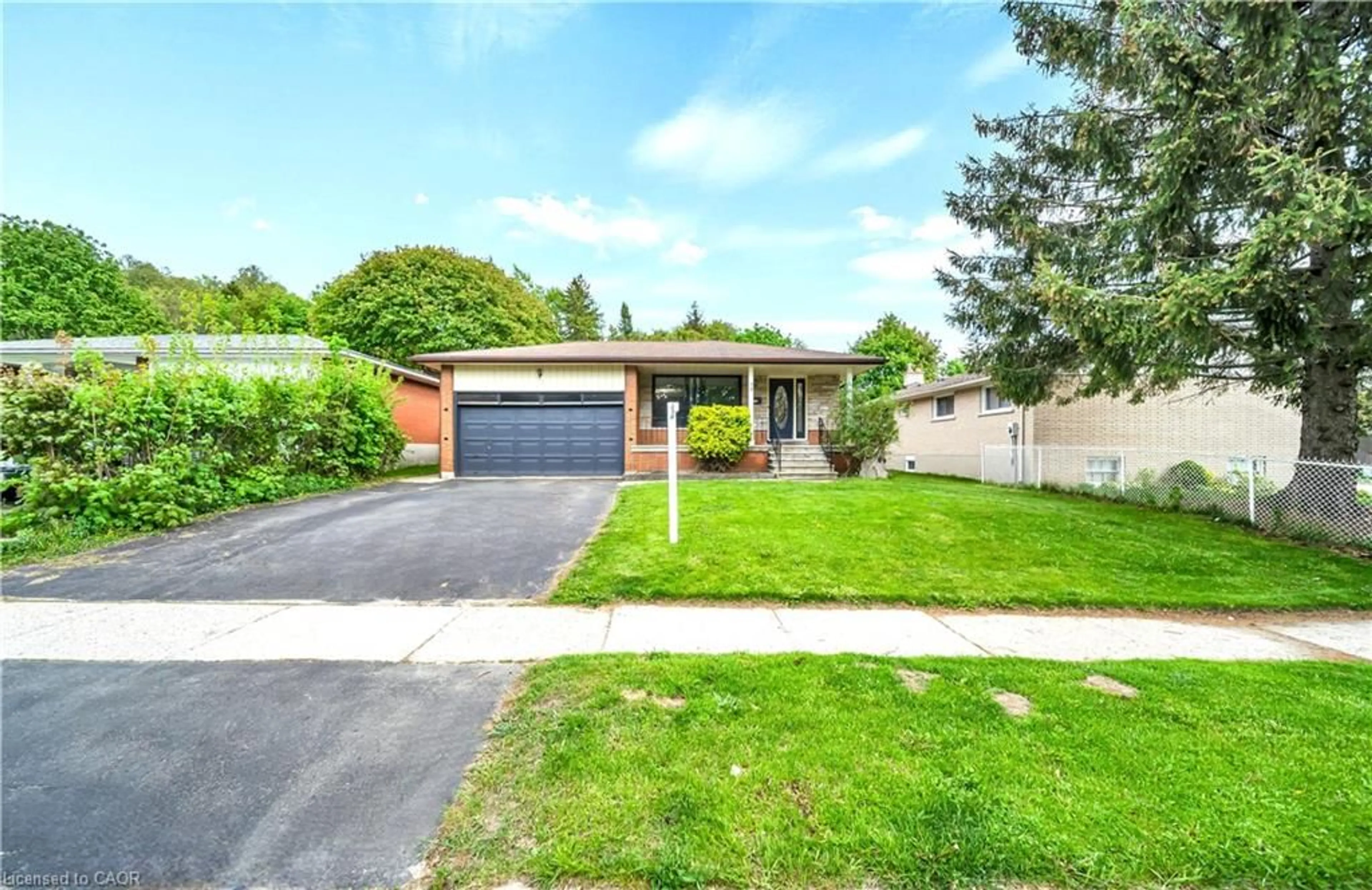 Home with brick exterior material, street for 70 Flanders Rd, Garden River Ontario N1G 1W3