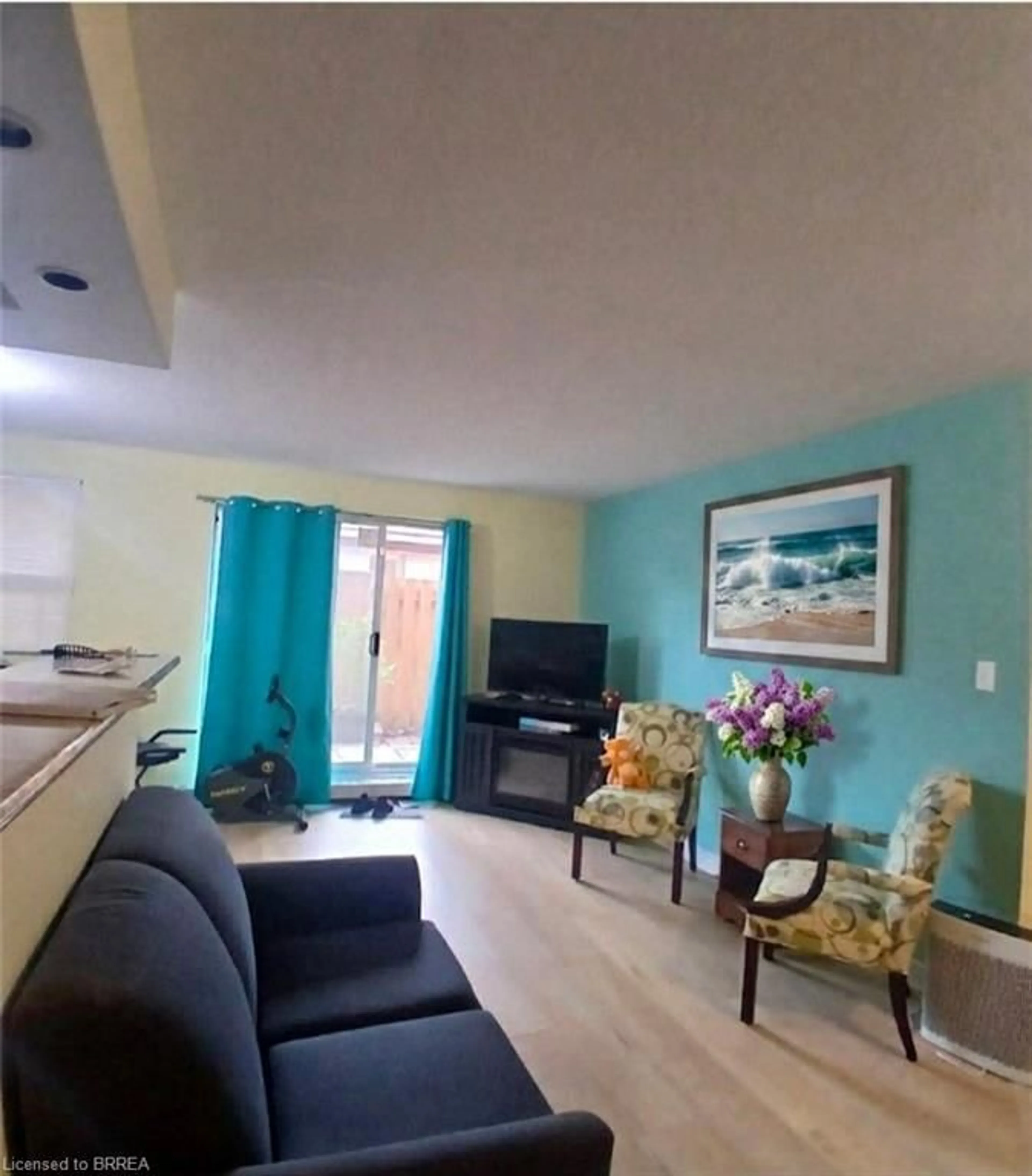 Living room with furniture, unknown for 793 Colborne St #104, Brantford Ontario N3S 7J3
