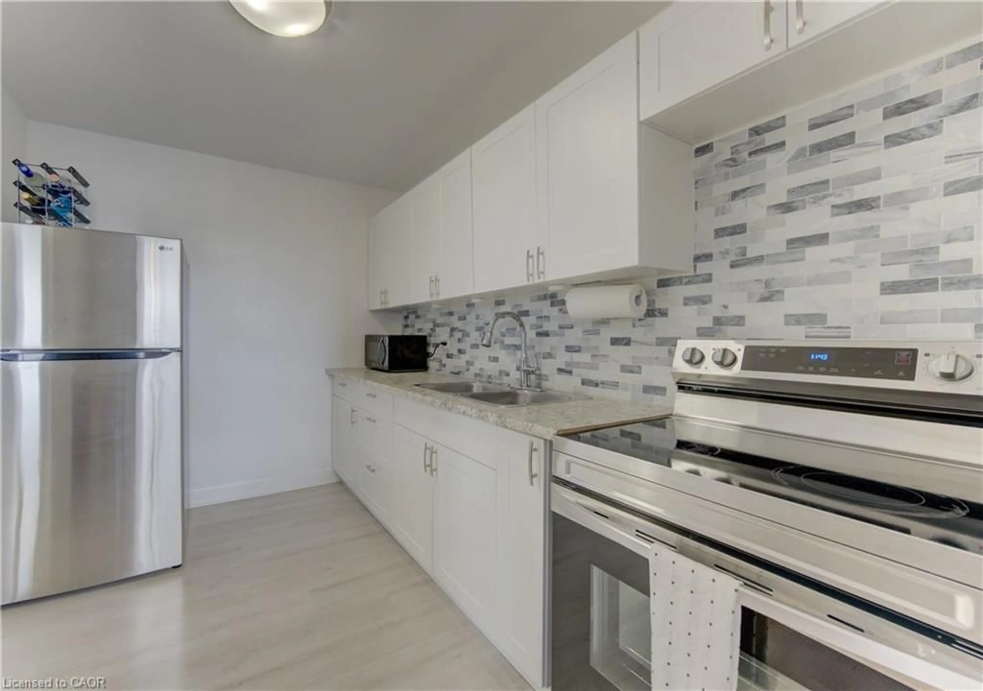 Standard kitchen, ceramic/tile floor for 1100 Courtland Ave #610, Kitchener Ontario N2C 2H9