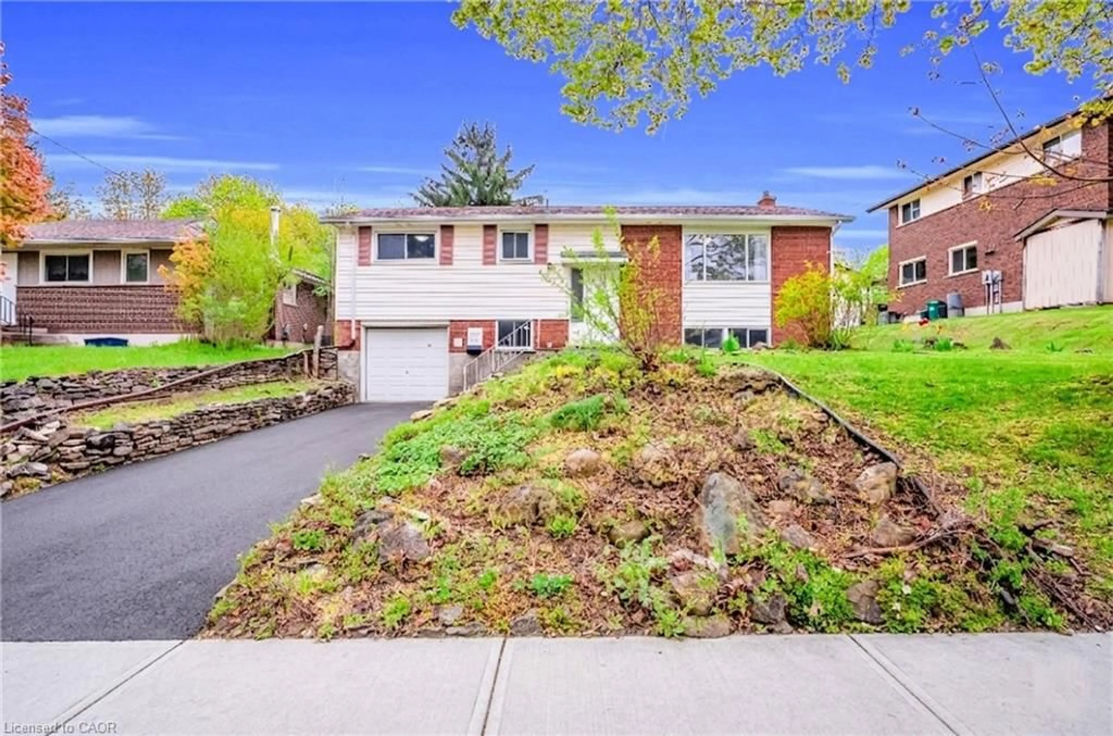 Home with brick exterior material, street for 57 High St, Waterloo Ontario N2L 3X7