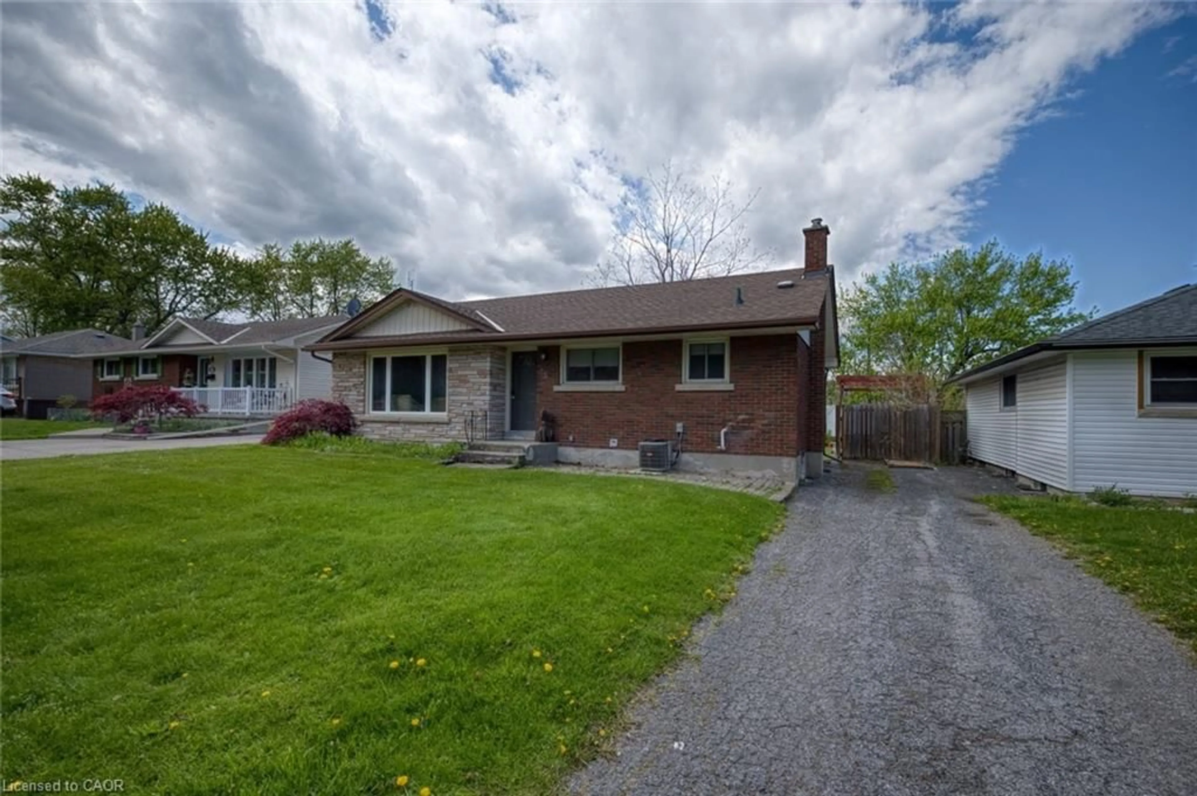 Home with brick exterior material, street for 25 Warkdale Dr, St. Catharines Ontario L2T 2V8