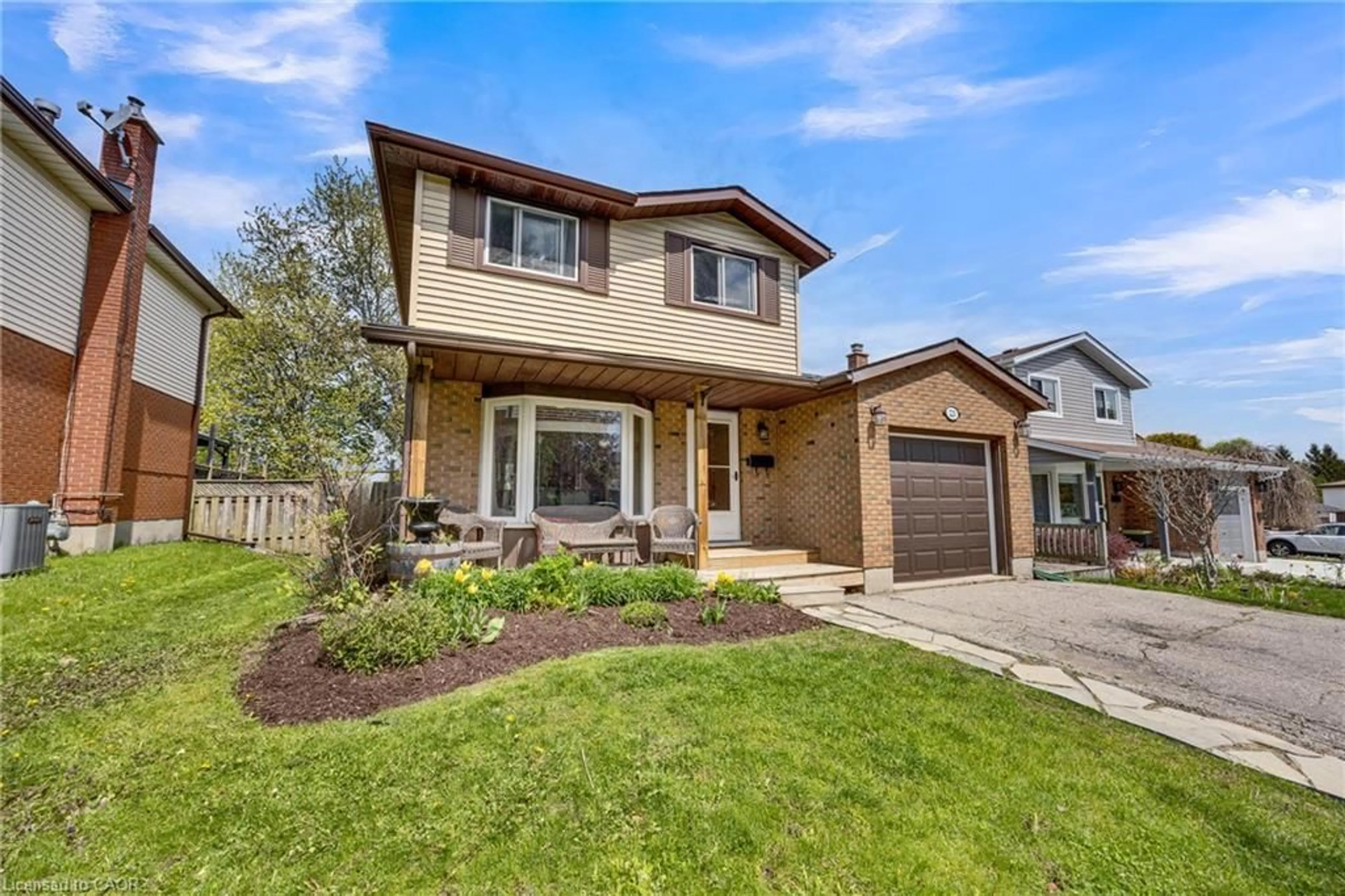 Home with brick exterior material, street for 220 Rosebank Pl, Kitchener Ontario N2E 2R8