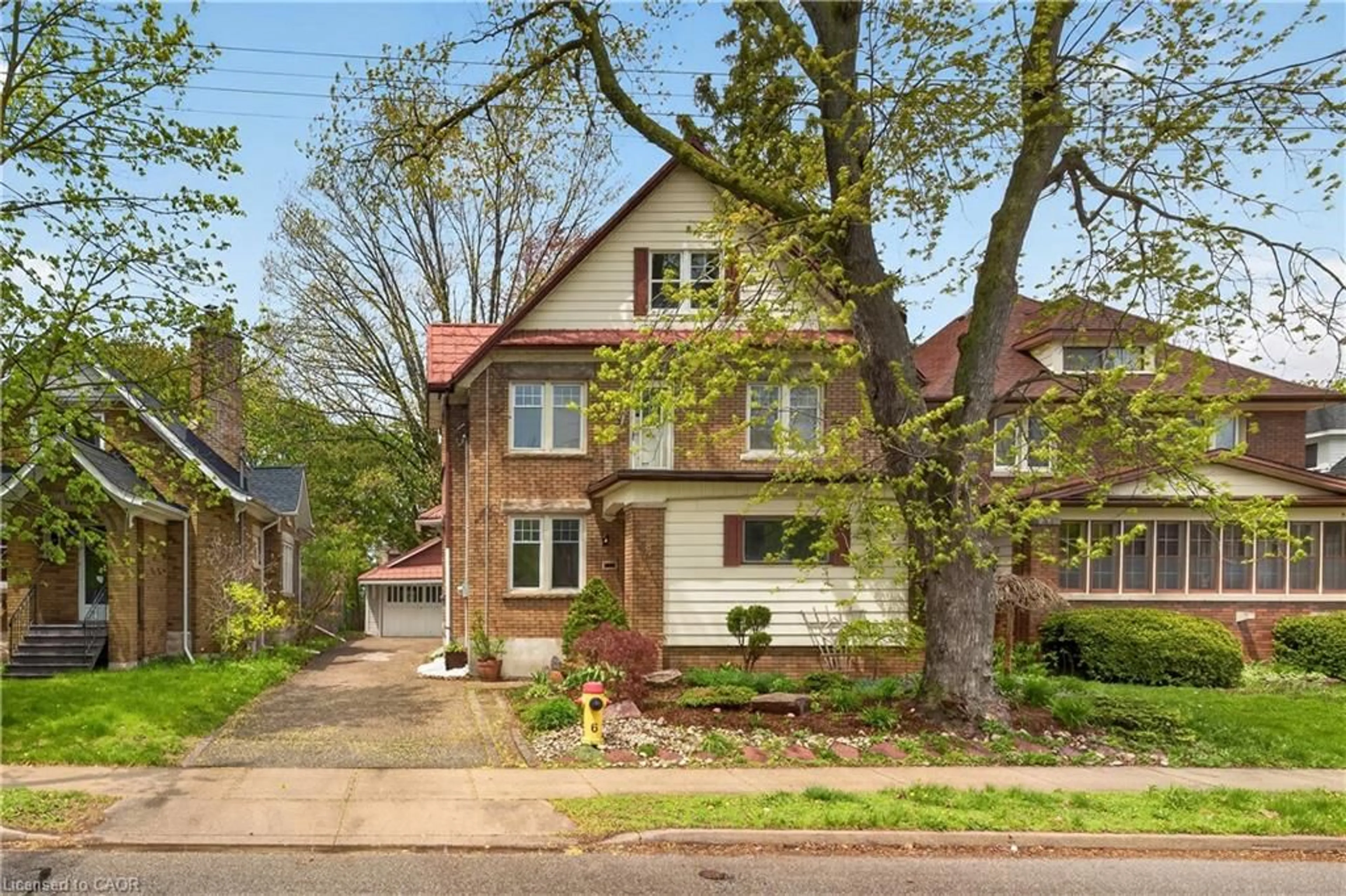 Home with brick exterior material, street for 48 Stirling Ave, Kitchener Ontario N2H 3G5