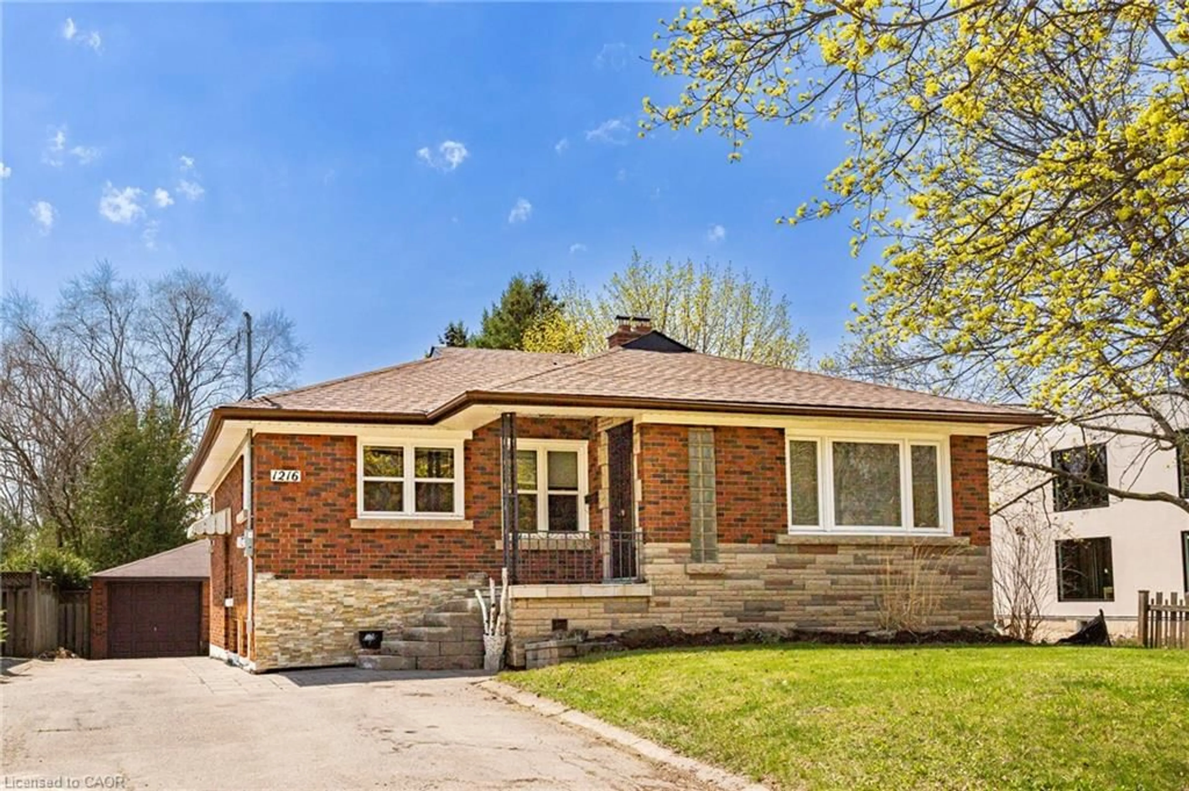 Home with brick exterior material, street for 1216 Fisher Ave, Burlington Ontario L7P 2L4