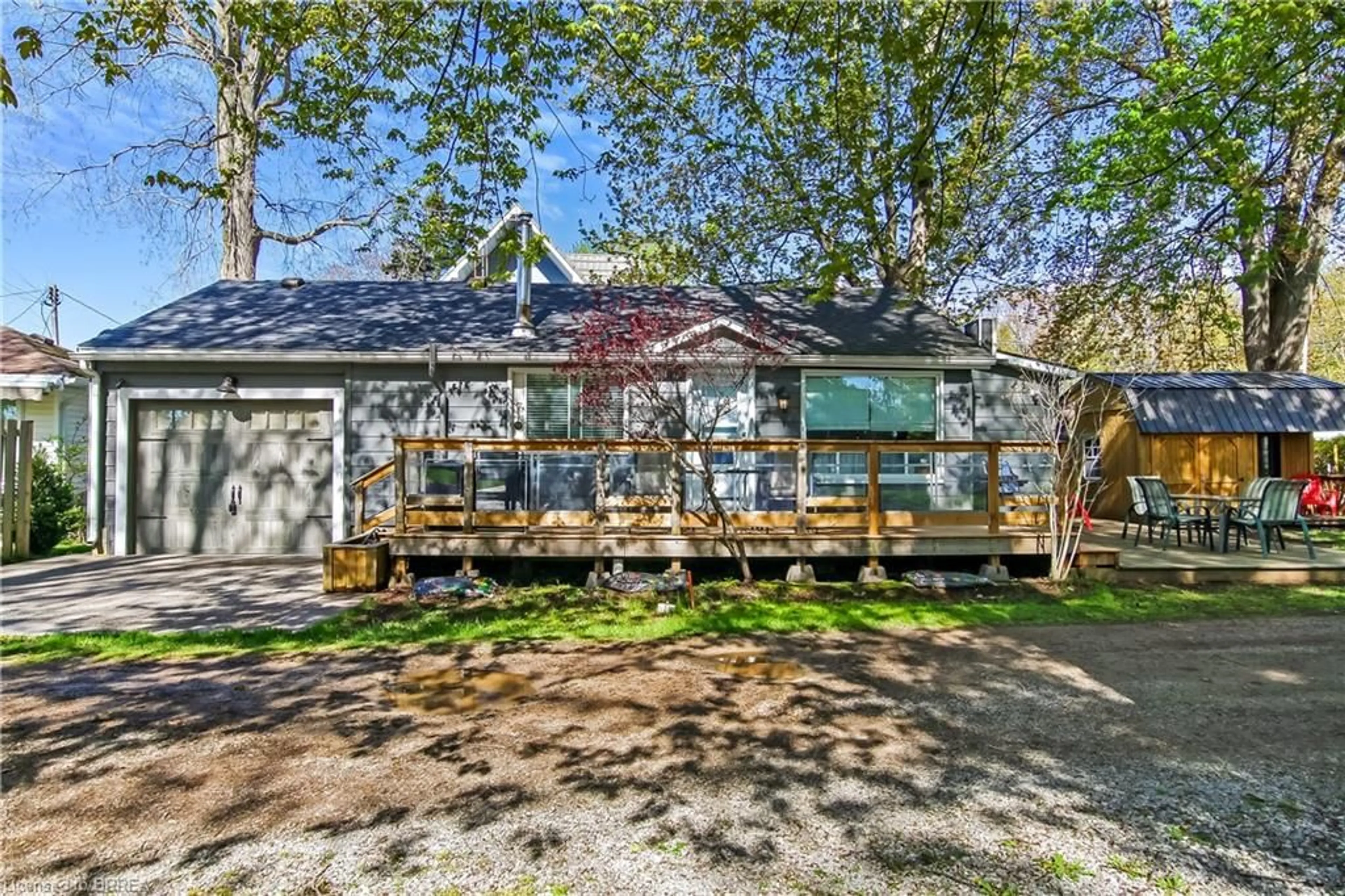 Home with vinyl exterior material, street for 4 Tyler St, Turkey Point Ontario N0E 1T0