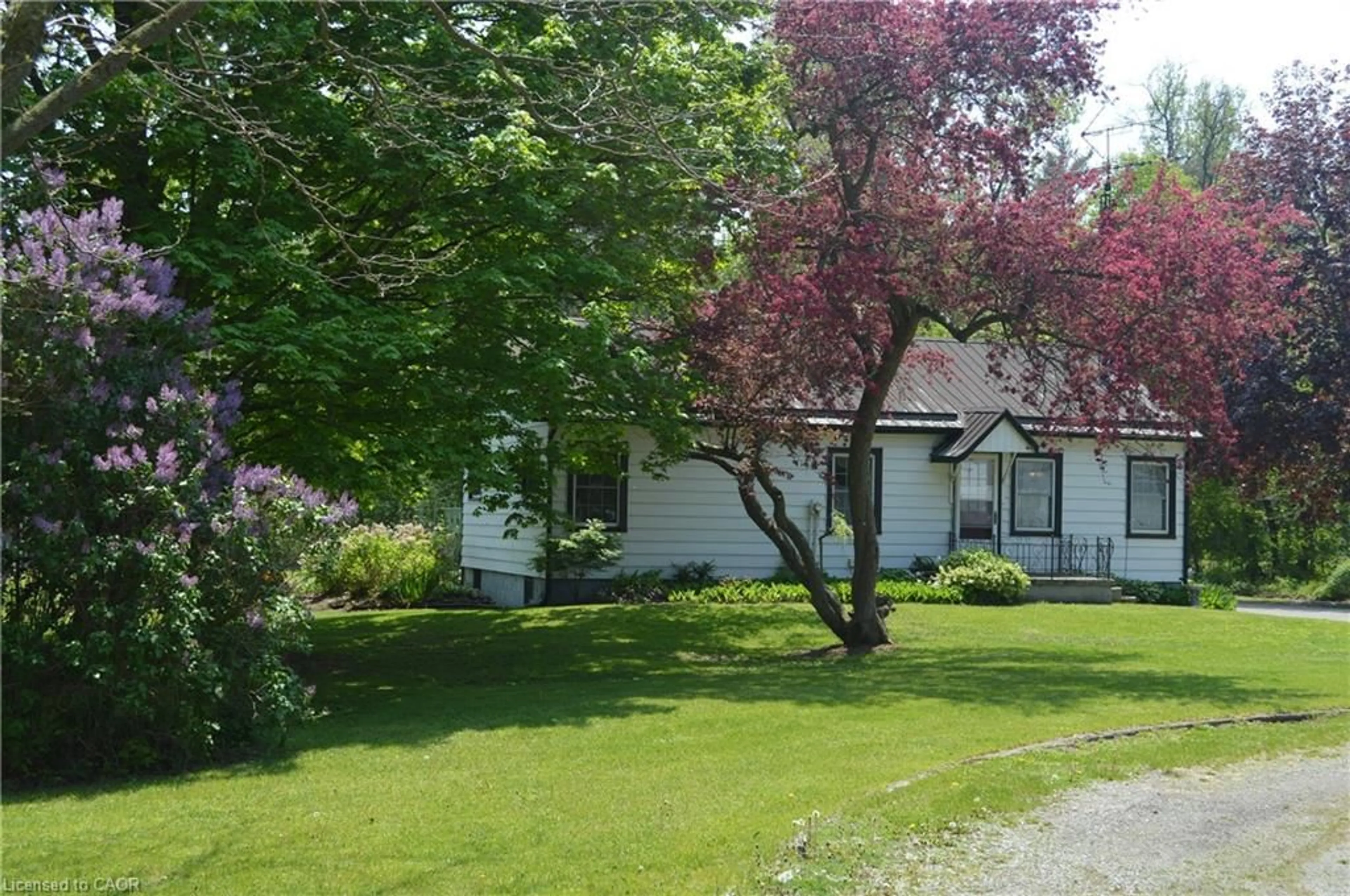 A pic from outside/outdoor area/front of a property/back of a property/a pic from drone, street for 424 Highway 6 Hwy, Port Dover Ontario N3Y 4K2