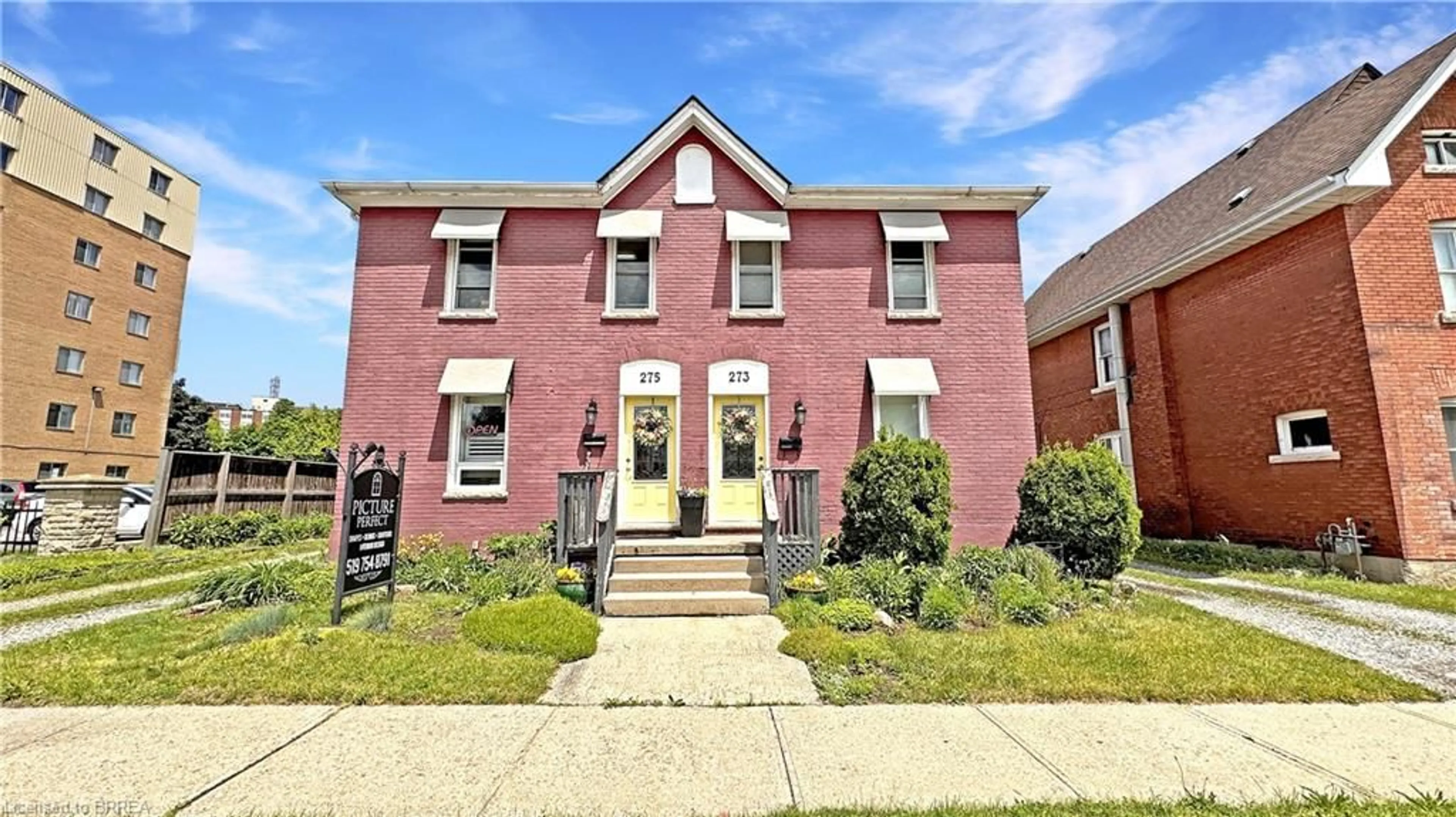 Home with brick exterior material, street for 273-275 Brant Ave, Brantford Ontario N3T 3J6