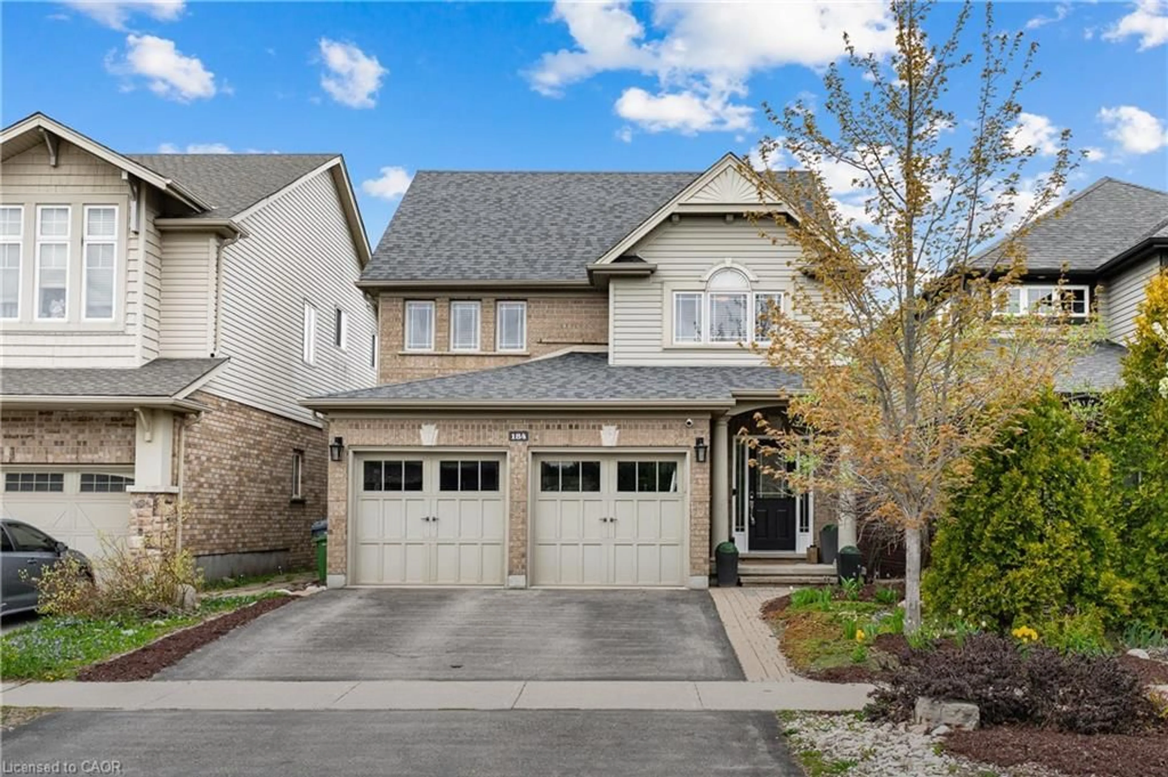 Home with brick exterior material, street for 184 Goodwin Dr, Guelph Ontario N1L 0C7