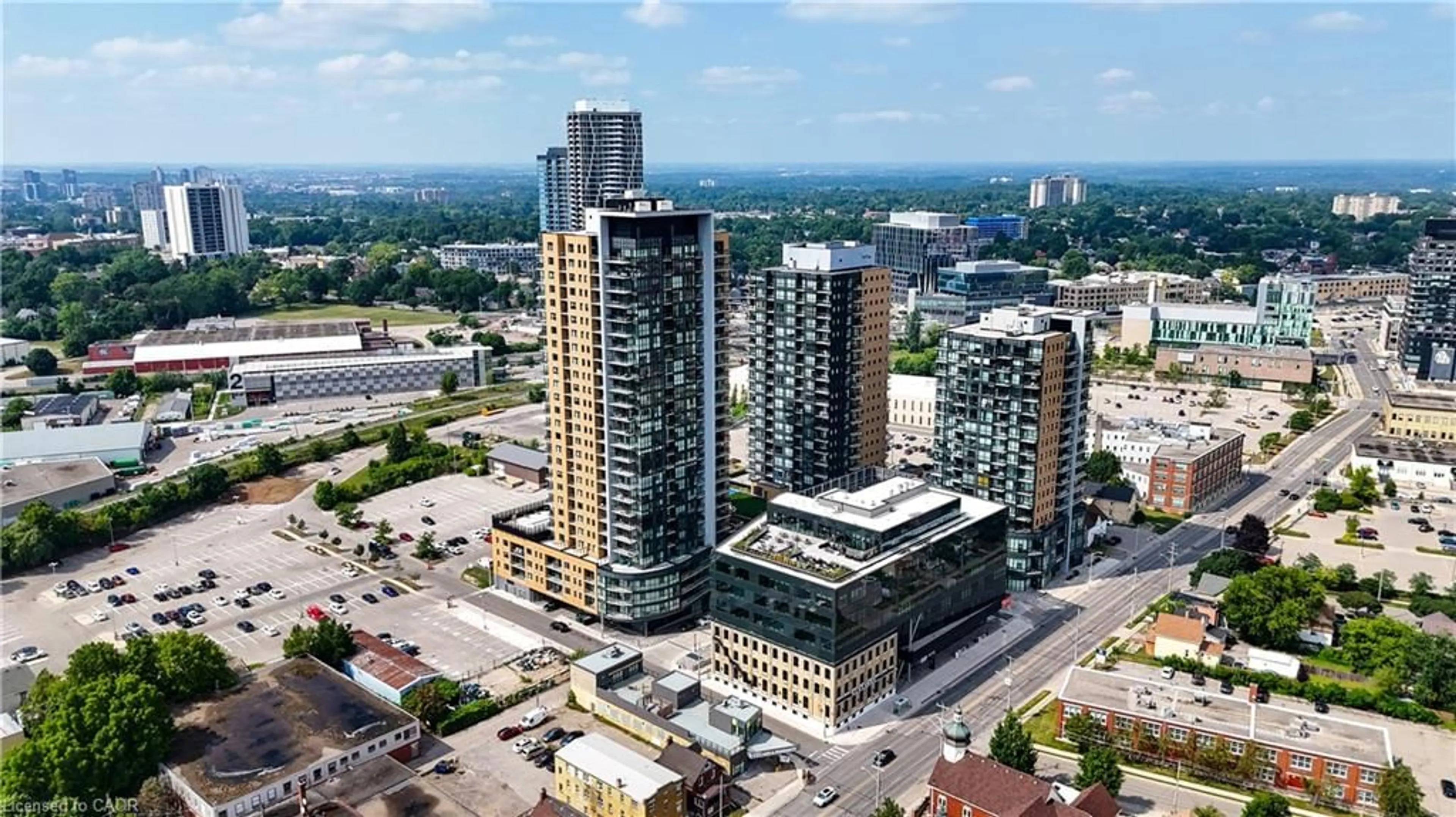 A pic from outside/outdoor area/front of a property/back of a property/a pic from drone, city buildings view from balcony for 100 Garment St #1007, Kitchener Ontario N2G 0C3