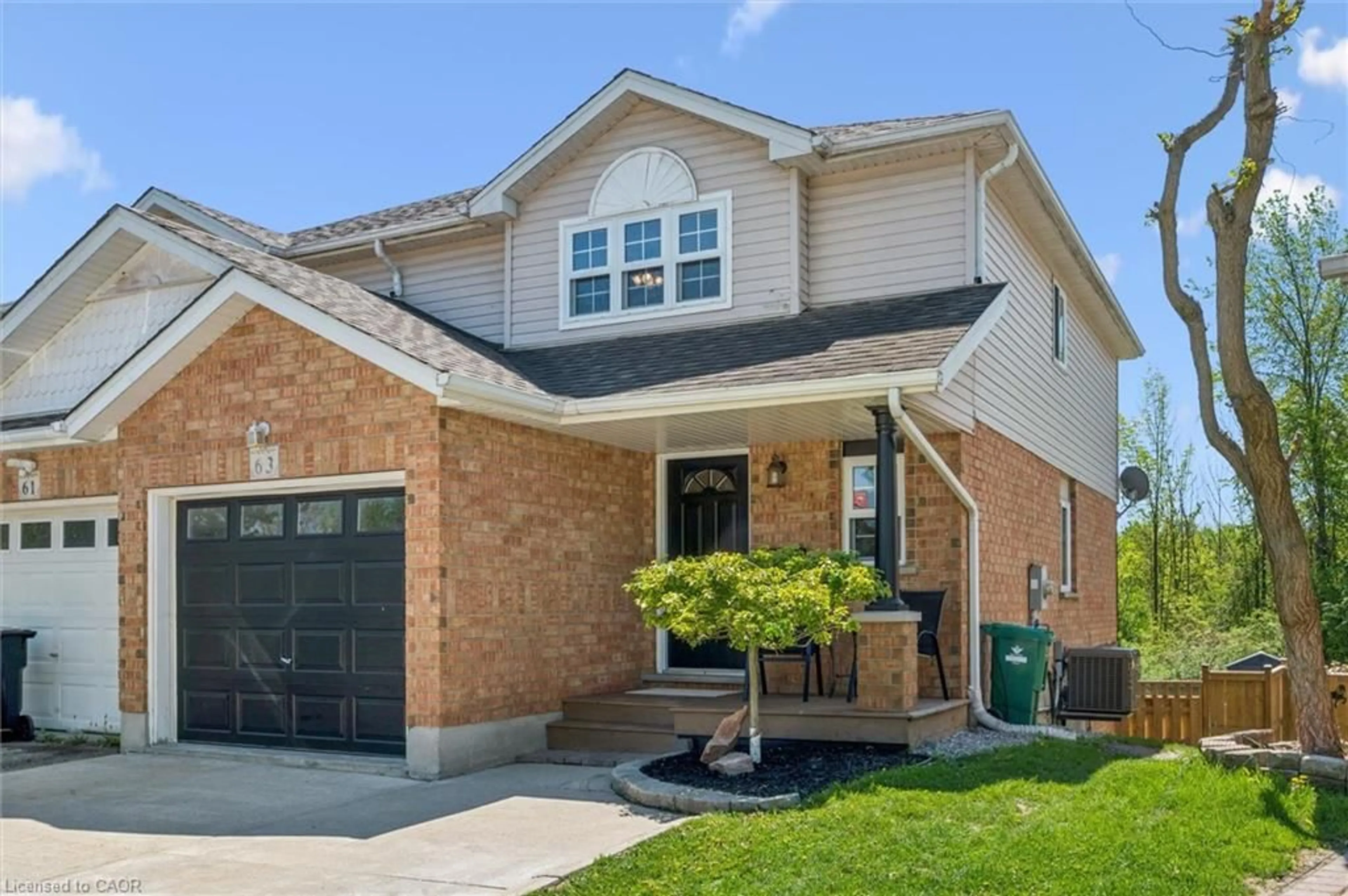 Home with brick exterior material, street for 63 Watercress Crt, Kitchener Ontario N2E 3S7