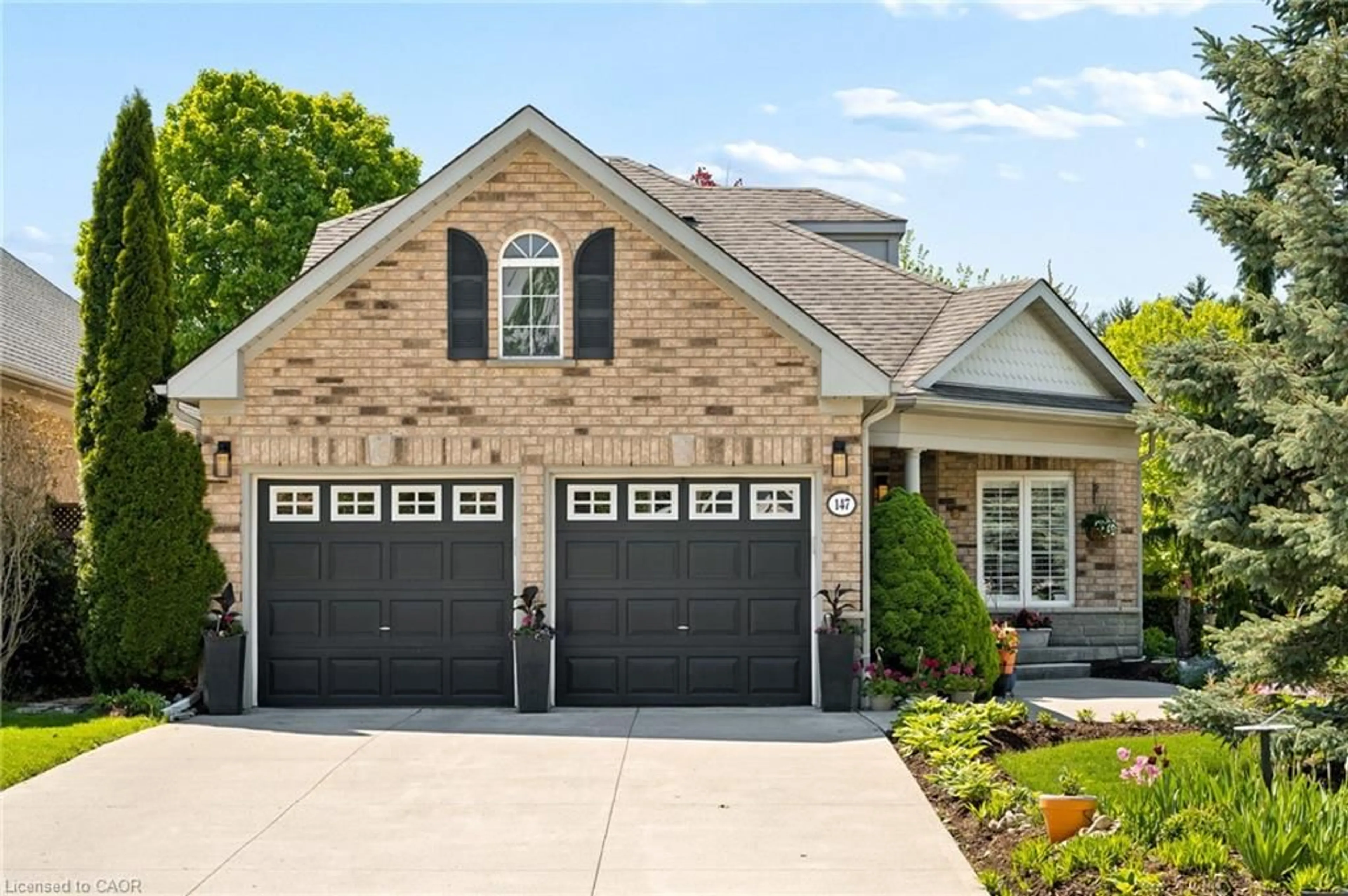 Home with brick exterior material, street for 147 Reiber Crt, Waterloo Ontario N2L 6N2