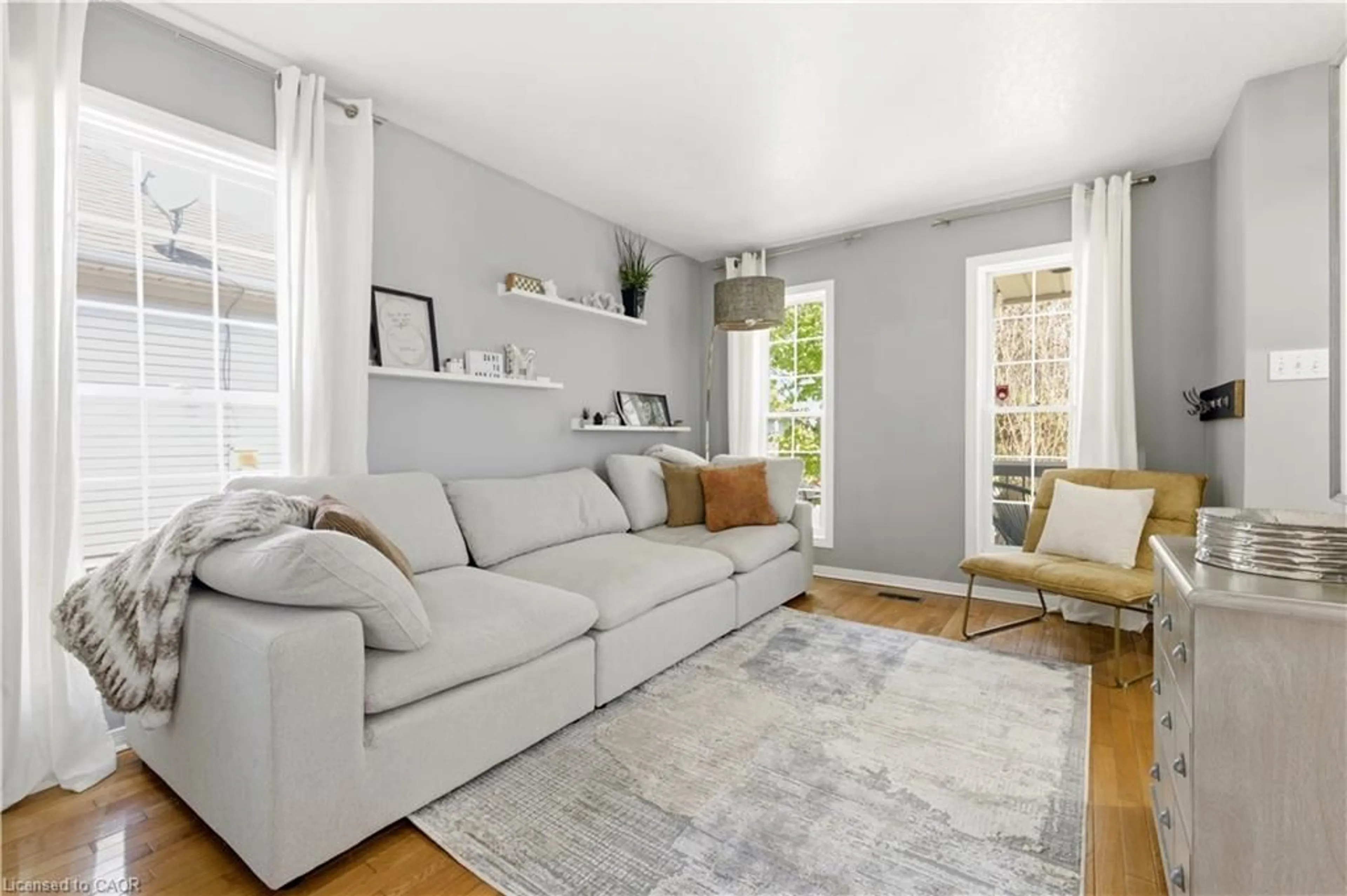 Living room with furniture, unknown for 19 Milfoil Cres, Kitchener Ontario N2E 3L2