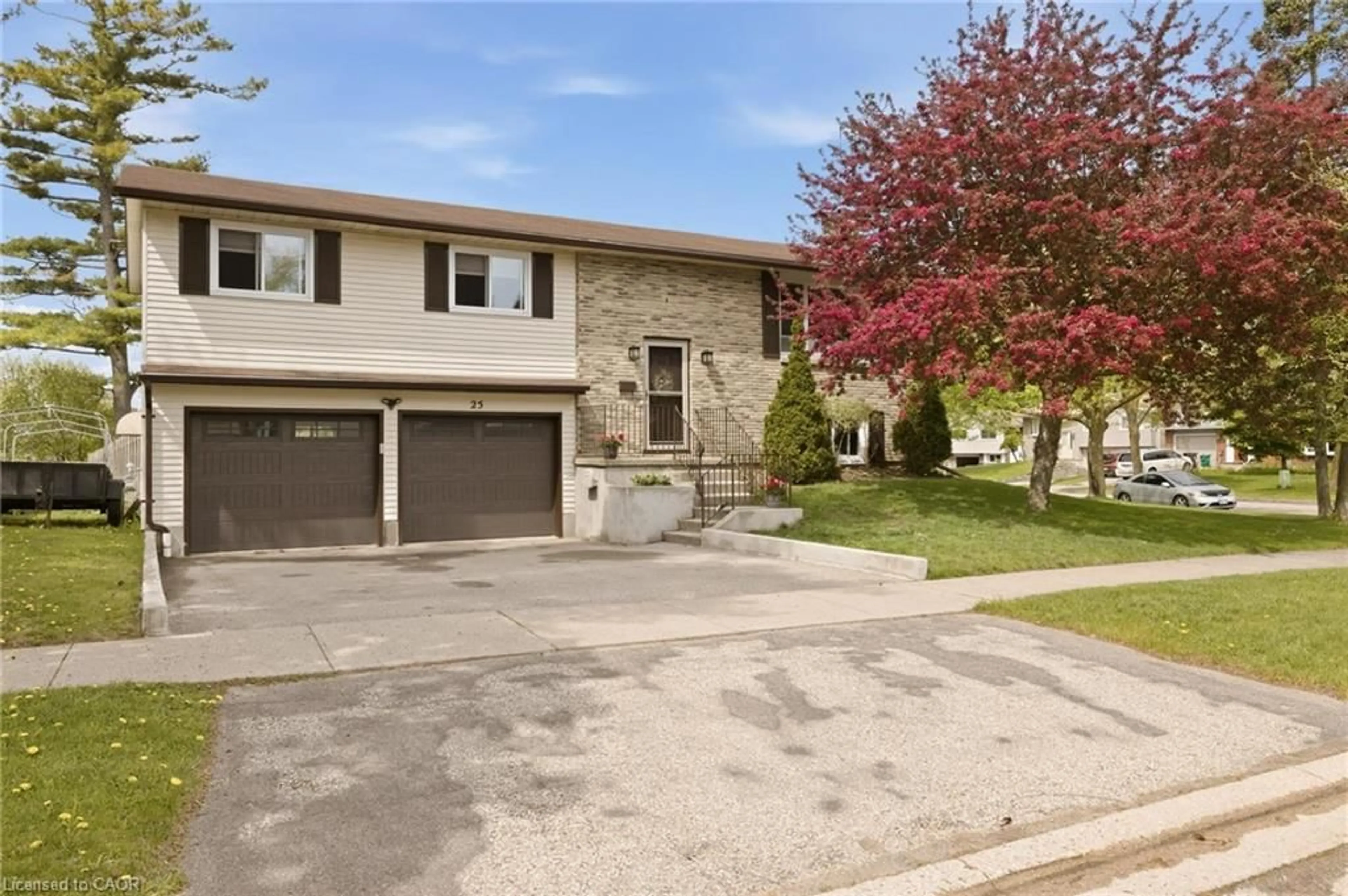 Home with brick exterior material, street for 25 Greenock Dr, Kitchener Ontario N2E 2J9