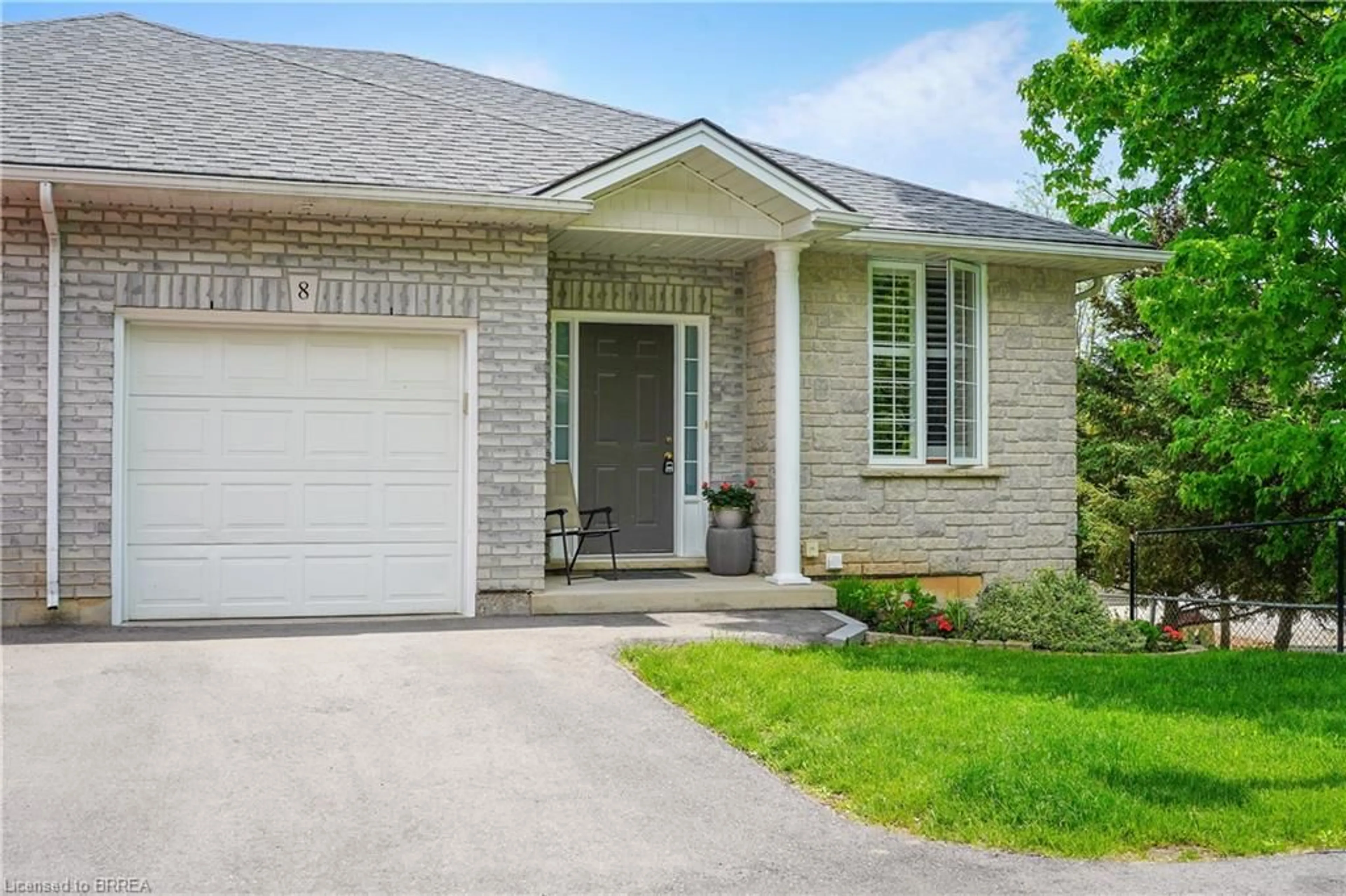 Home with brick exterior material, street for 219 Shellard Lane #8, Brantford Ontario N3T 0B8