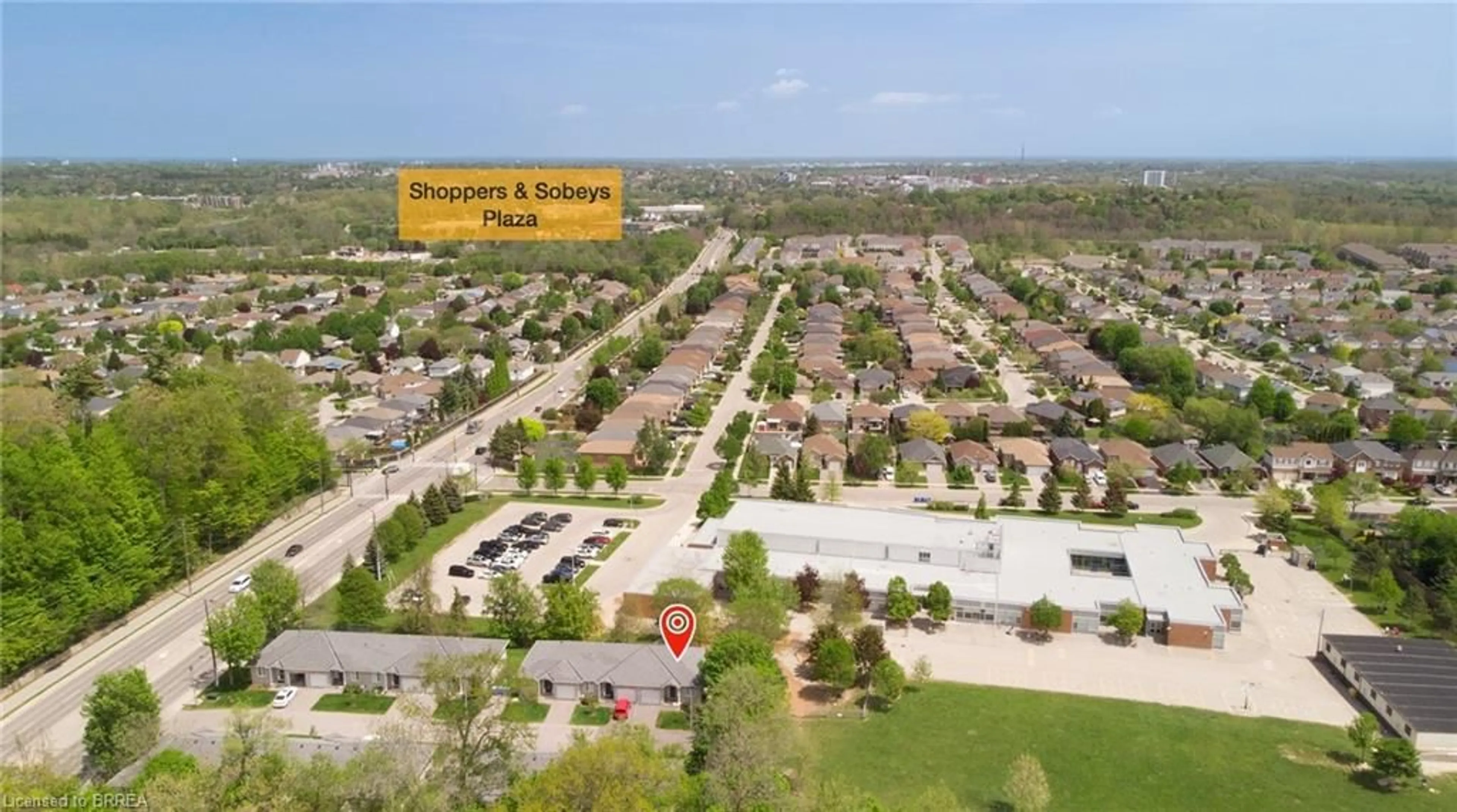 A pic from outside/outdoor area/front of a property/back of a property/a pic from drone, street for 219 Shellard Lane #8, Brantford Ontario N3T 0B8