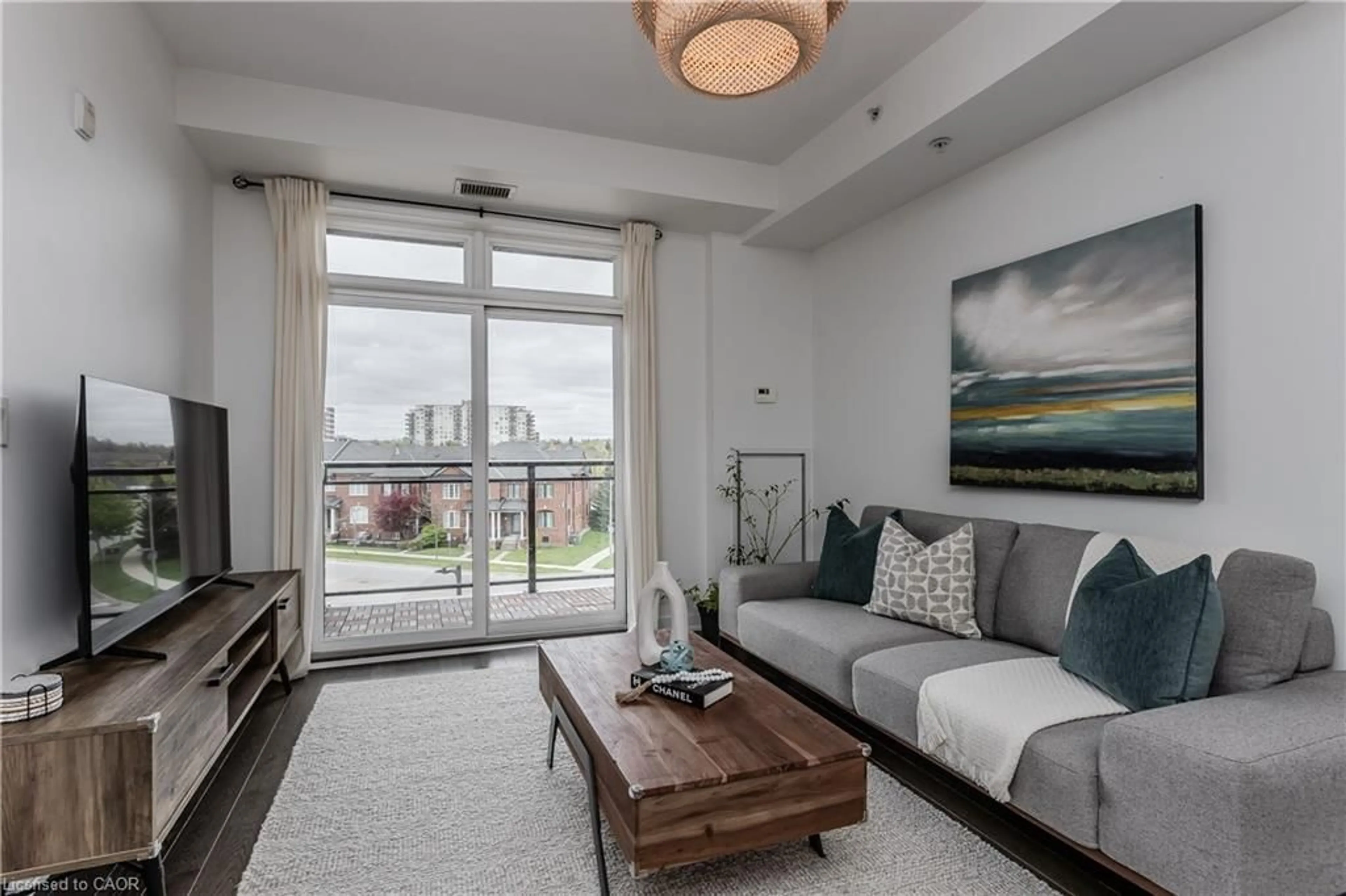 Living room with furniture, unknown for 5010 Corporate Dr #307, Burlington Ontario L7L 0H6