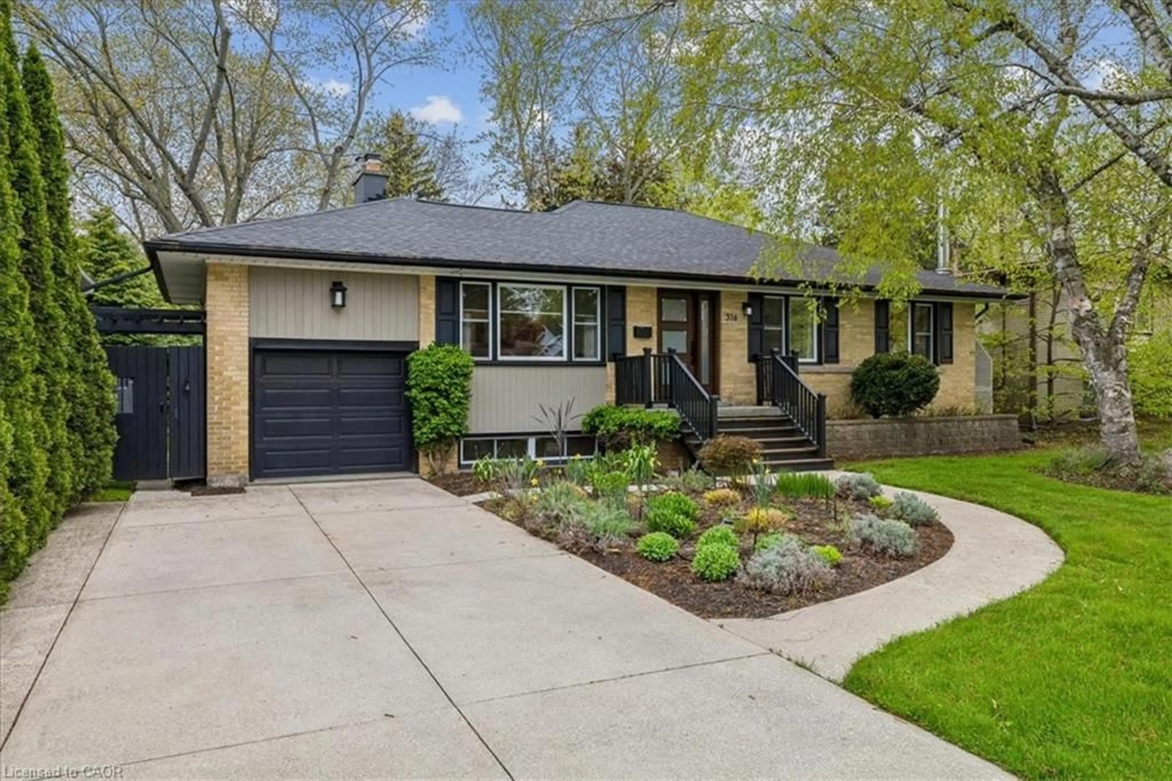 Home with brick exterior material, street for 316 River Side Dr, Oakville Ontario L6K 3N4