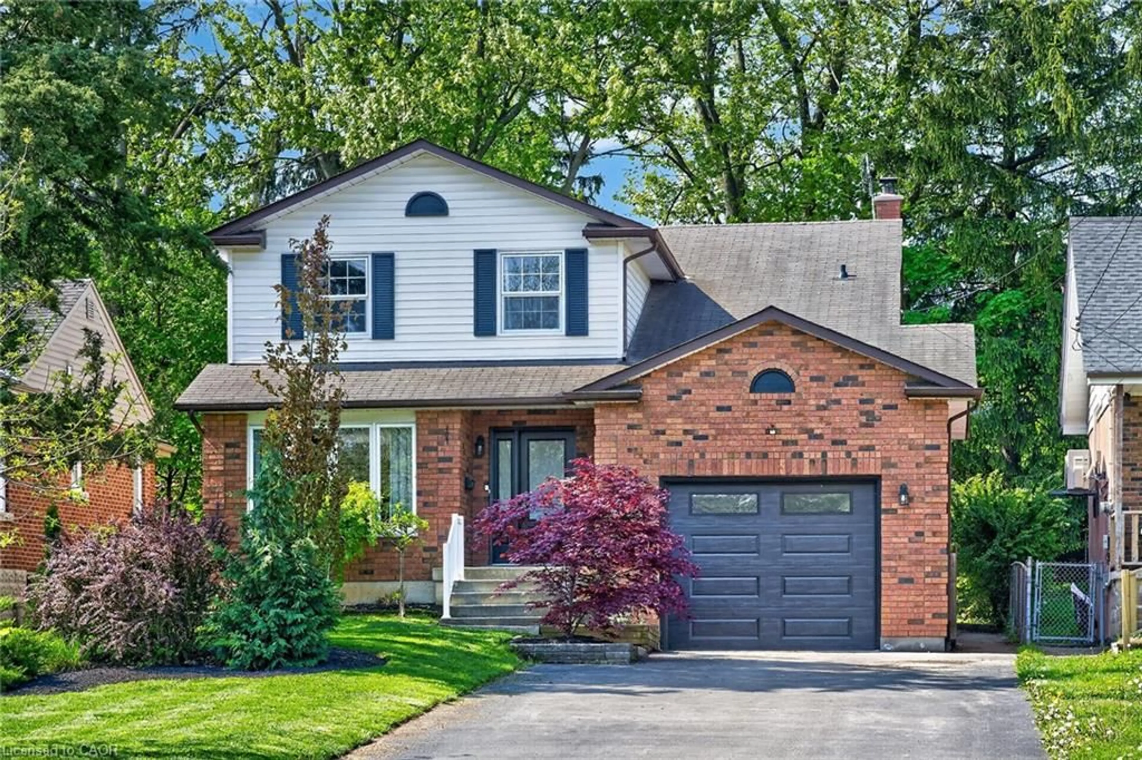 Home with brick exterior material, street for 309 Sanatorium Rd, Hamilton Ontario L9C 1Z4