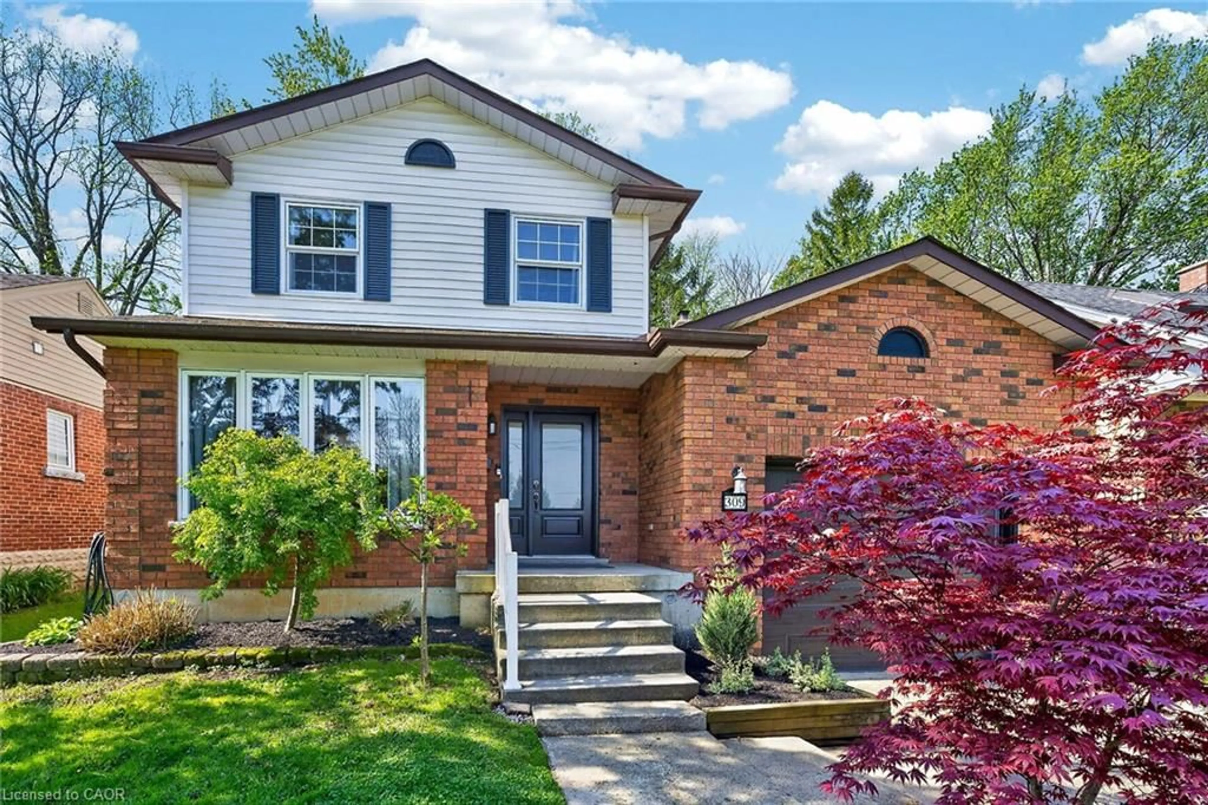 Home with brick exterior material, street for 309 Sanatorium Rd, Hamilton Ontario L9C 1Z4