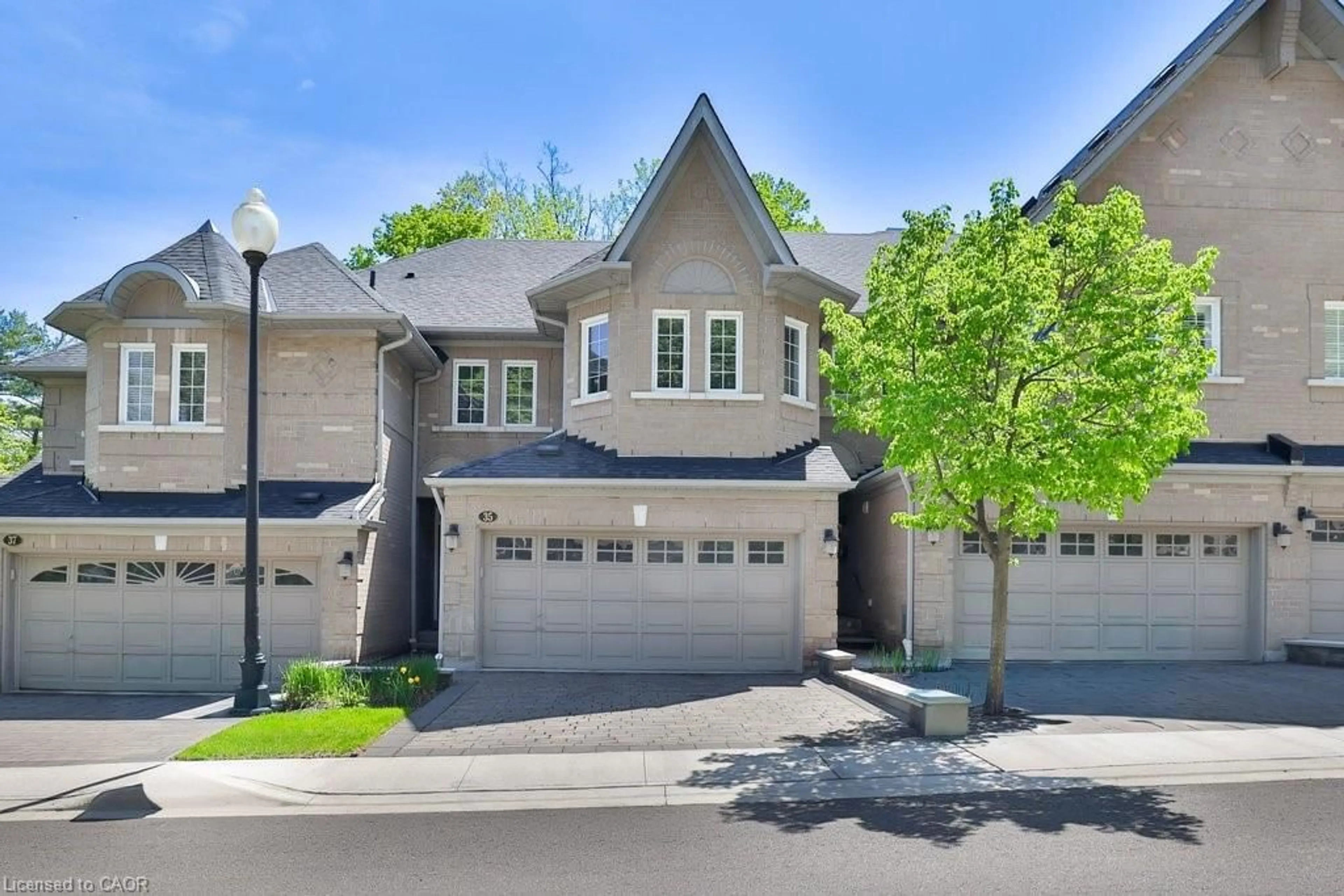 Home with brick exterior material, street for 2000 The Collegeway #35, Mississauga Ontario L5L 5Y9