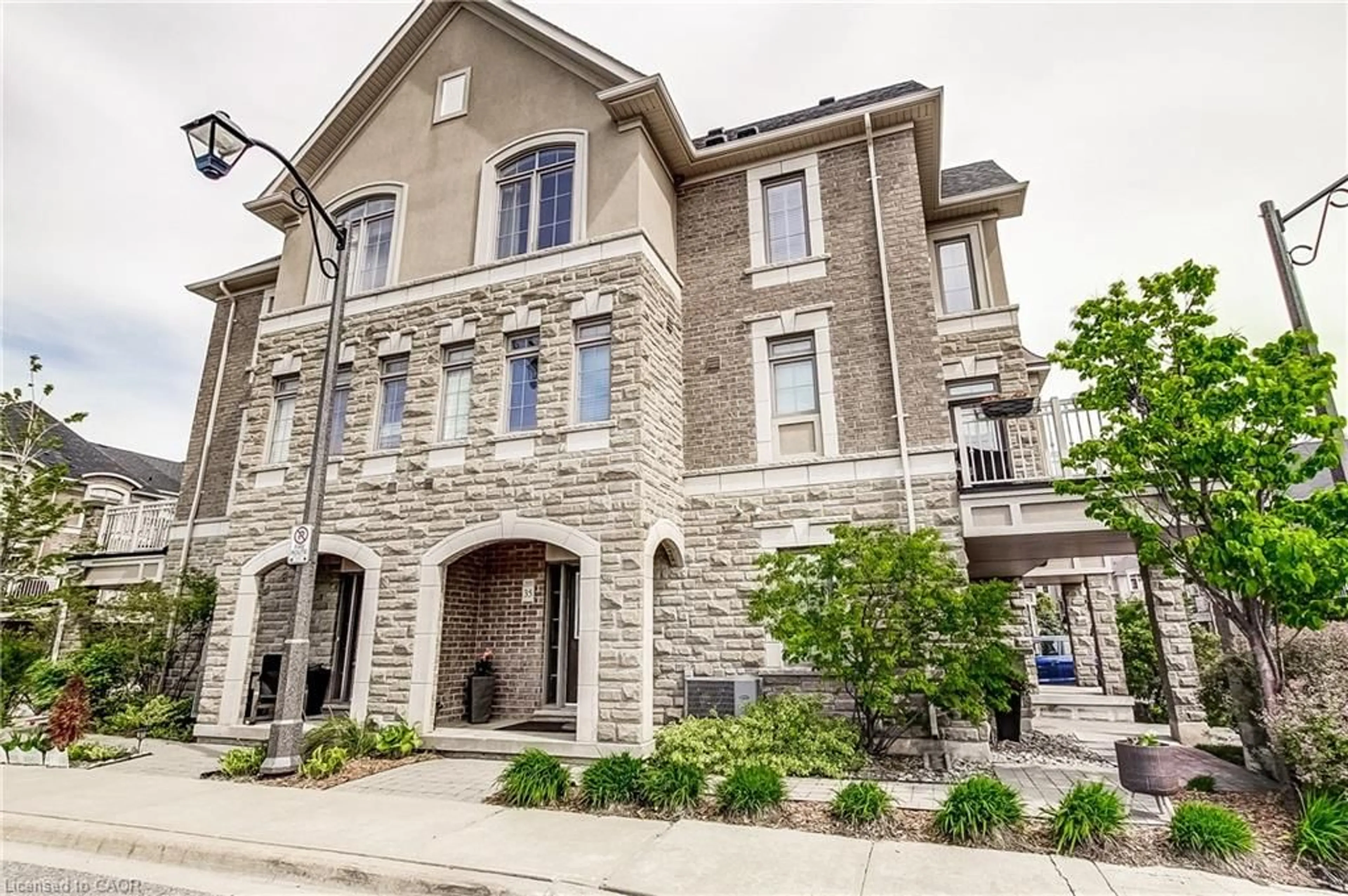 Home with brick exterior material, street for 2435 Greenwich Dr #35, Oakville Ontario L6M 0S4