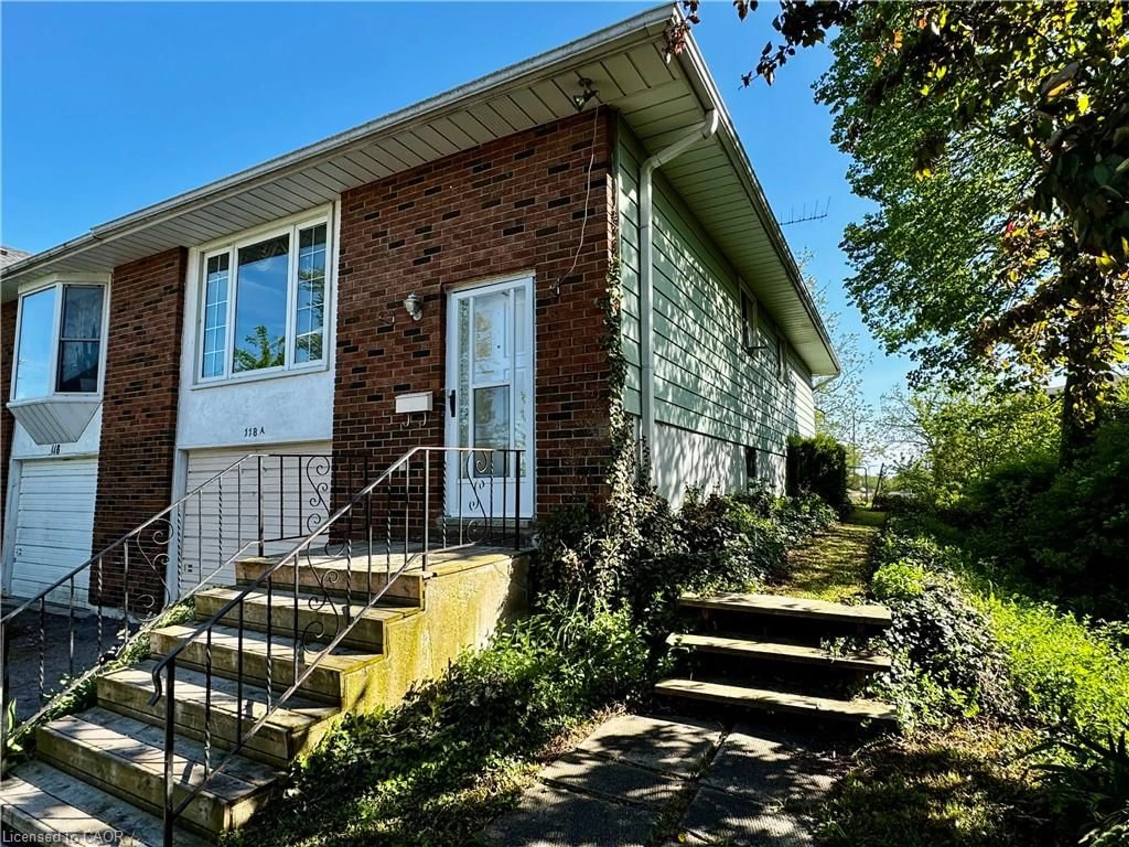 Home with brick exterior material, street for 118A Lock St, Dunnville Ontario N1A 1T9