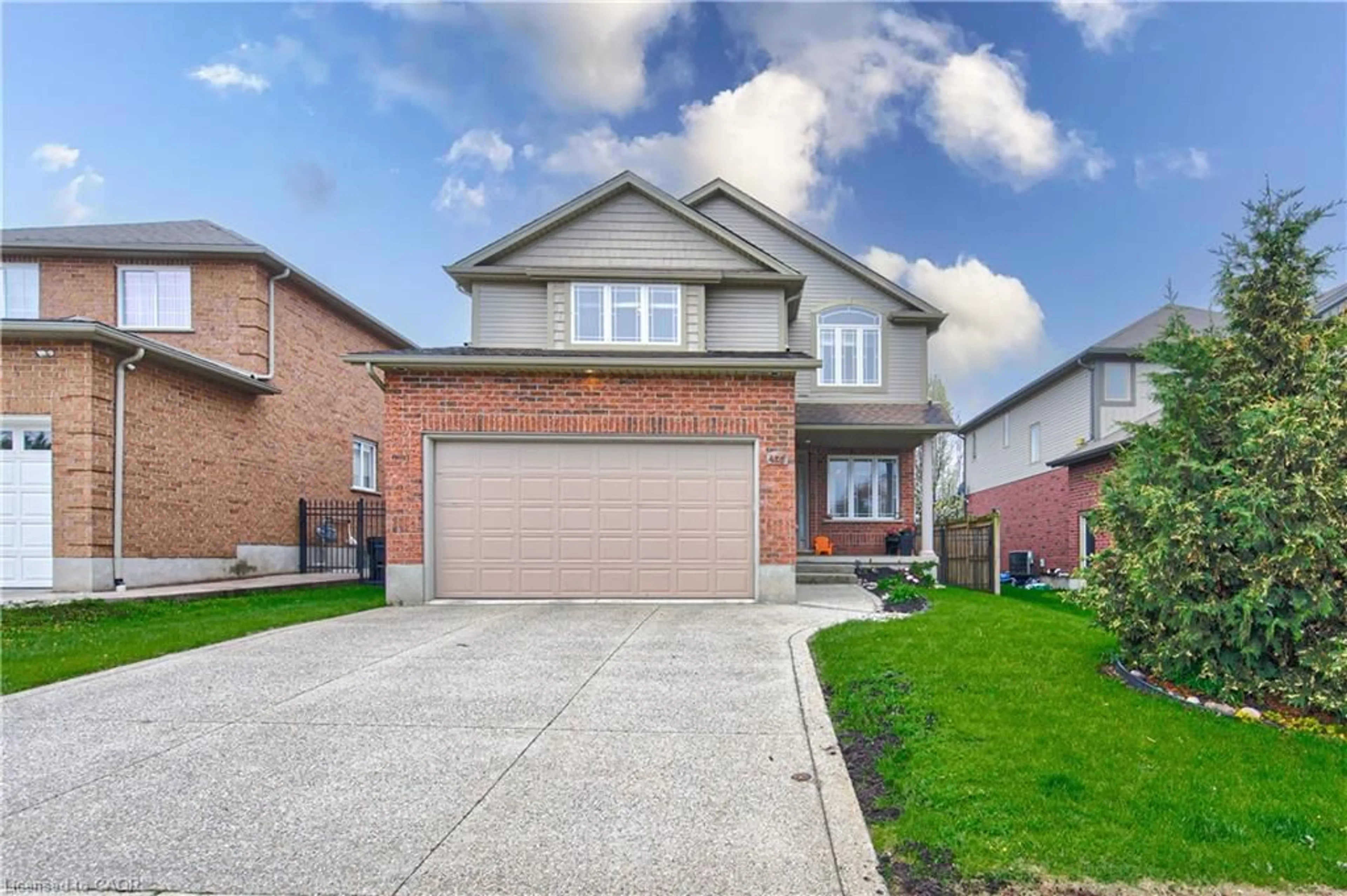 Home with brick exterior material, street for 455 Westcroft Dr, Waterloo Ontario N2T 3A1