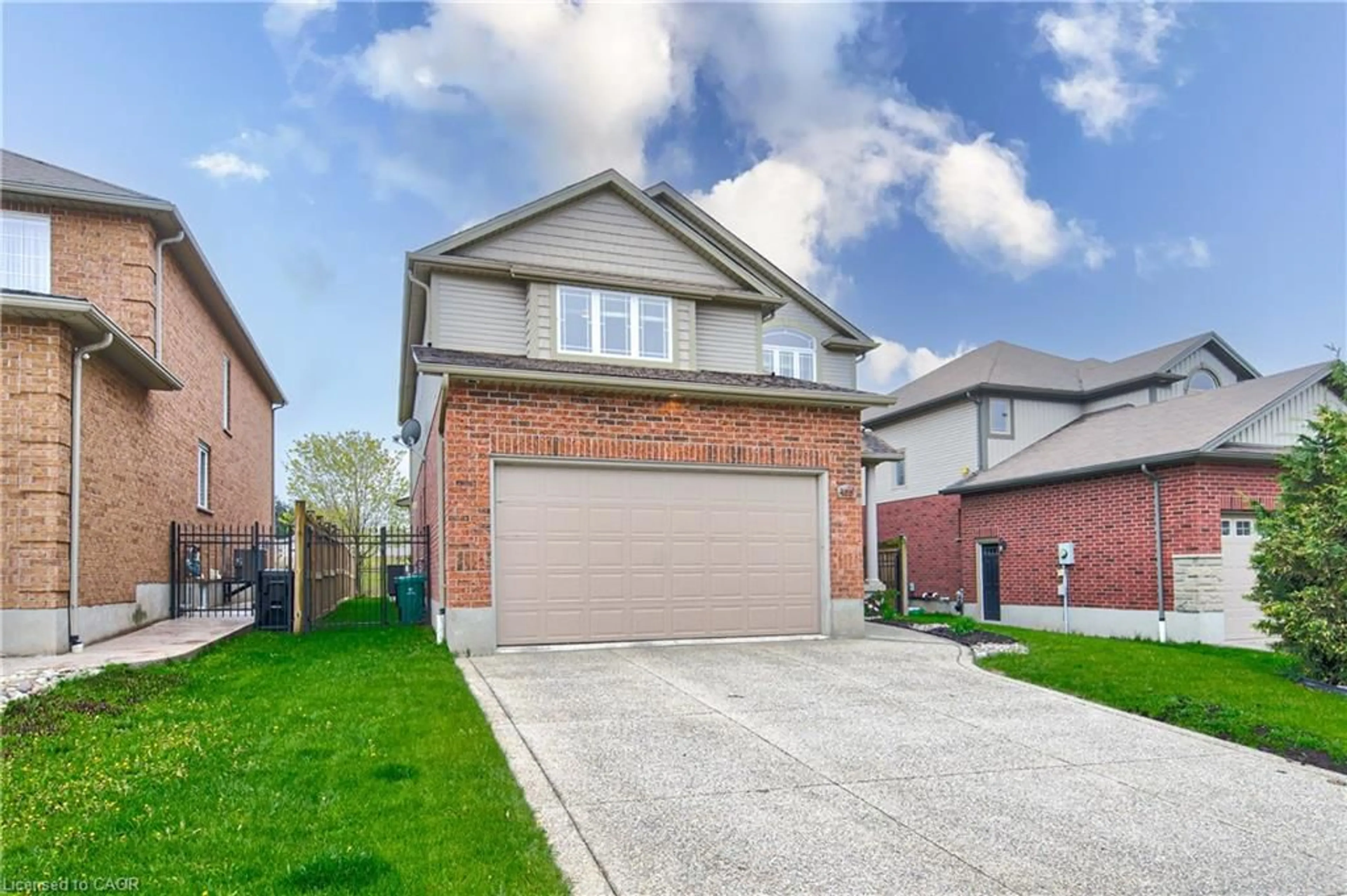 Home with brick exterior material, street for 455 Westcroft Dr, Waterloo Ontario N2T 3A1