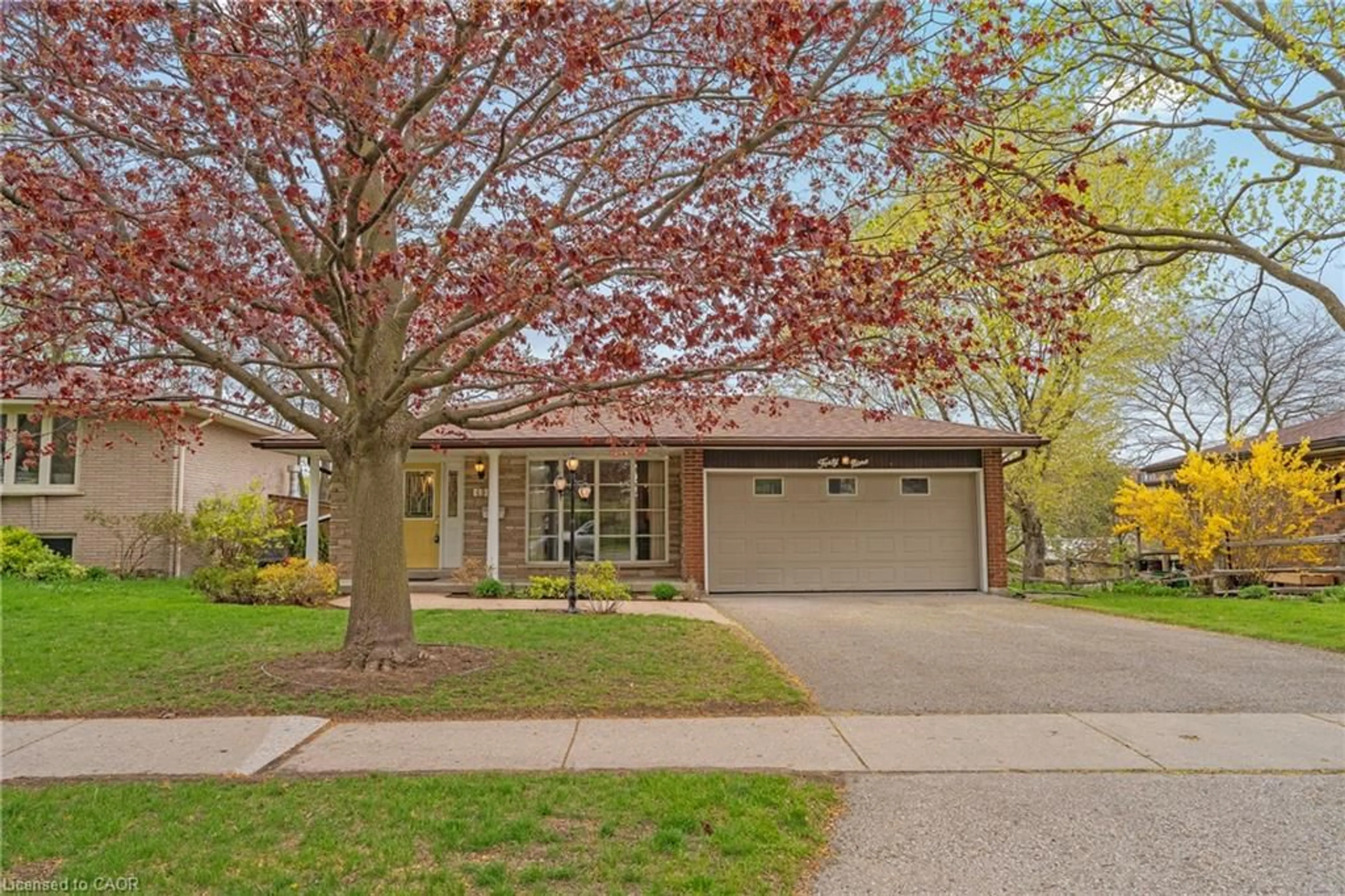 Home with brick exterior material, street for 49 Vanier Dr, Guelph Ontario N1G 2K9