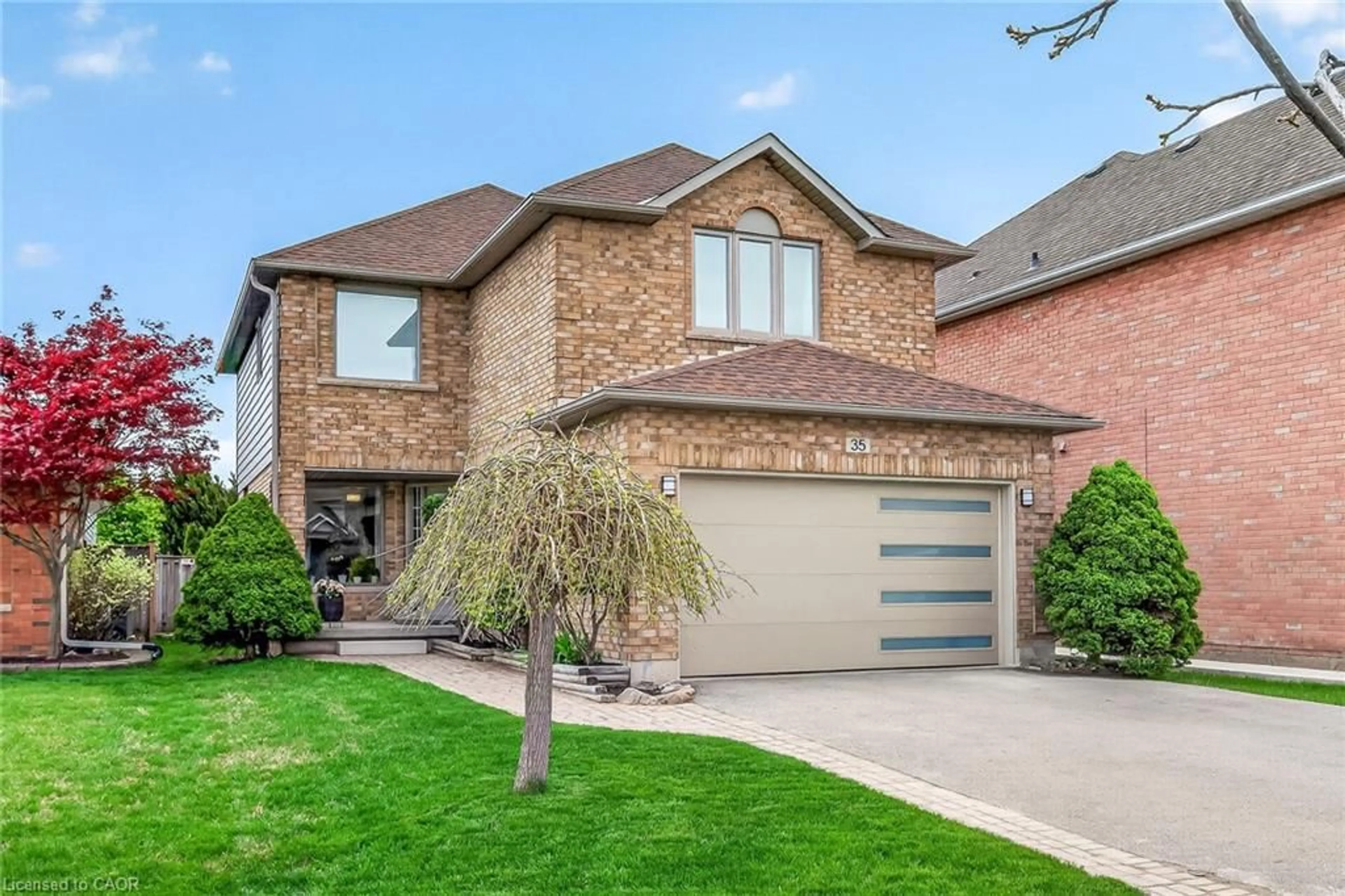 Home with brick exterior material, street for 35 Cove Cres, Stoney Creek Ontario L8E 5A3