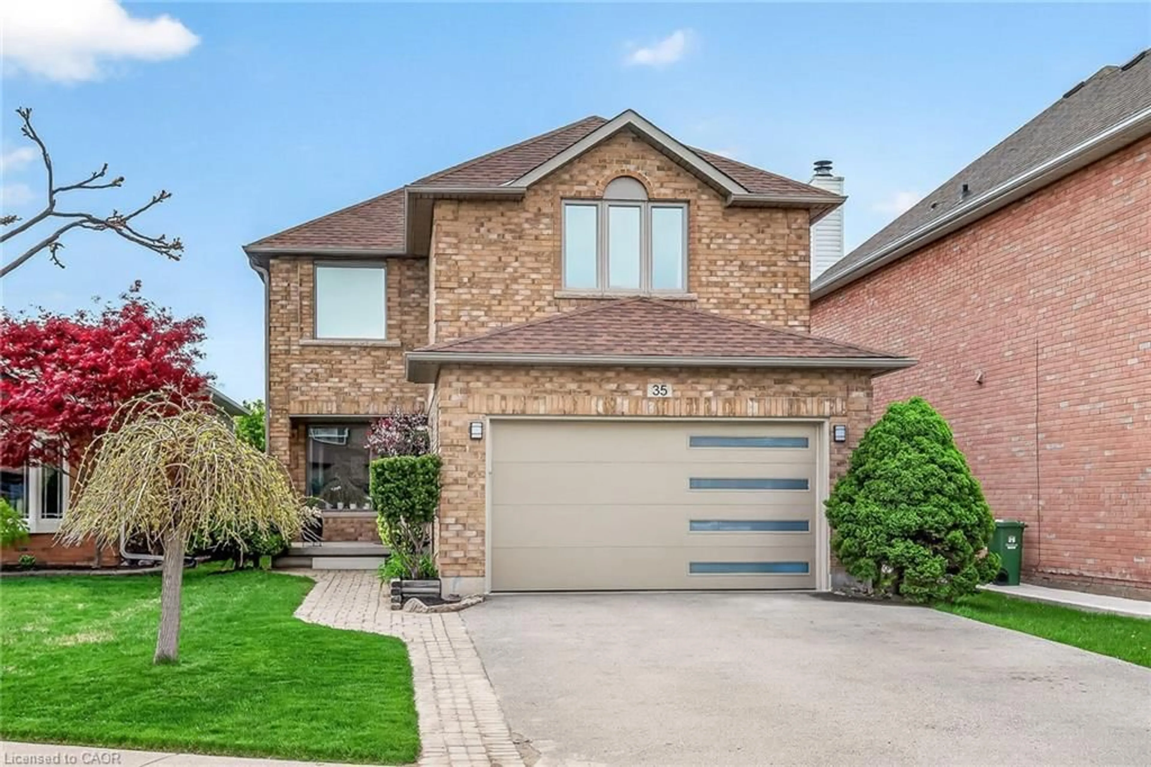 Home with brick exterior material, street for 35 Cove Cres, Stoney Creek Ontario L8E 5A3