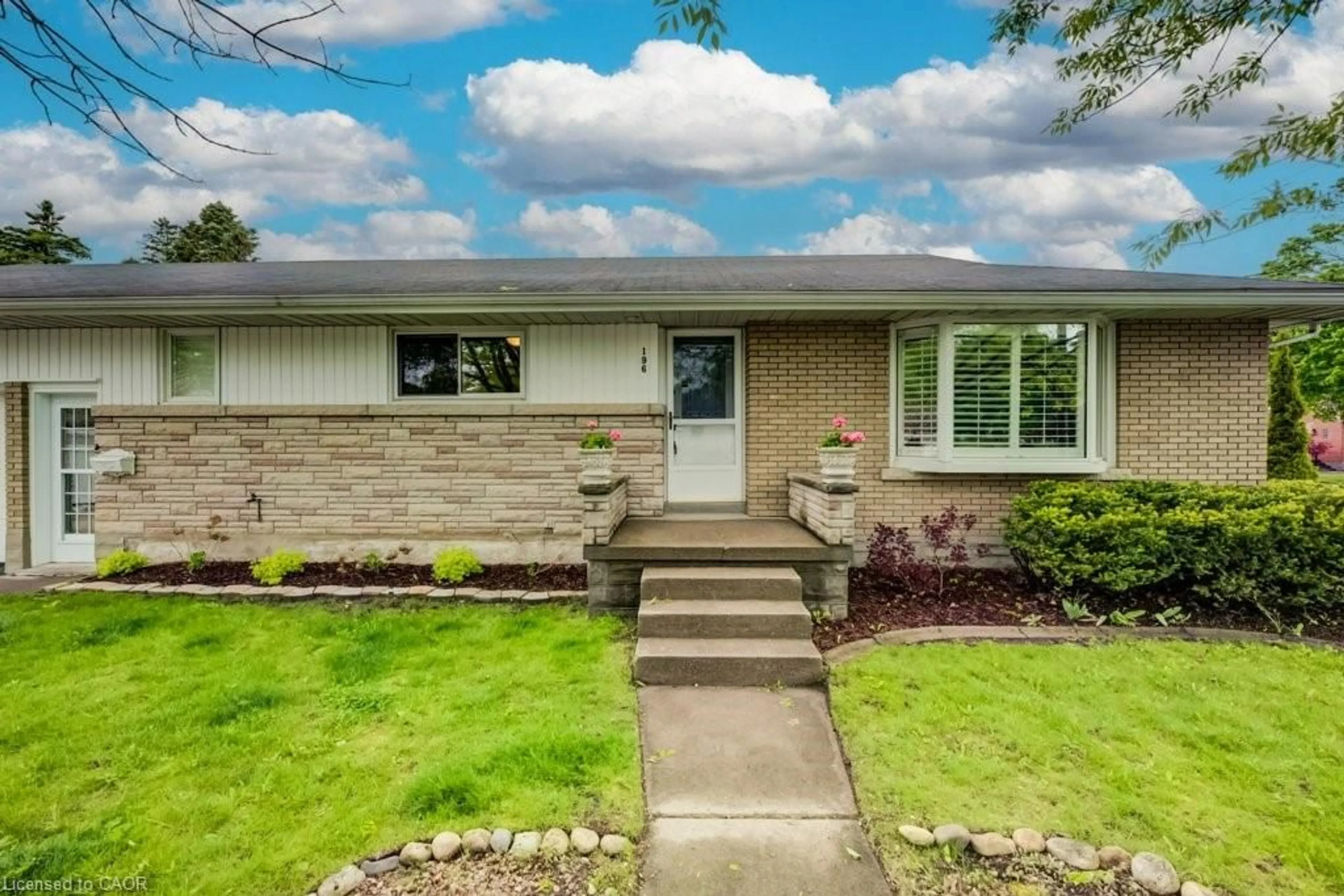 Home with brick exterior material, street for 196 Lourdes St, Waterloo Ontario N2L 1N7