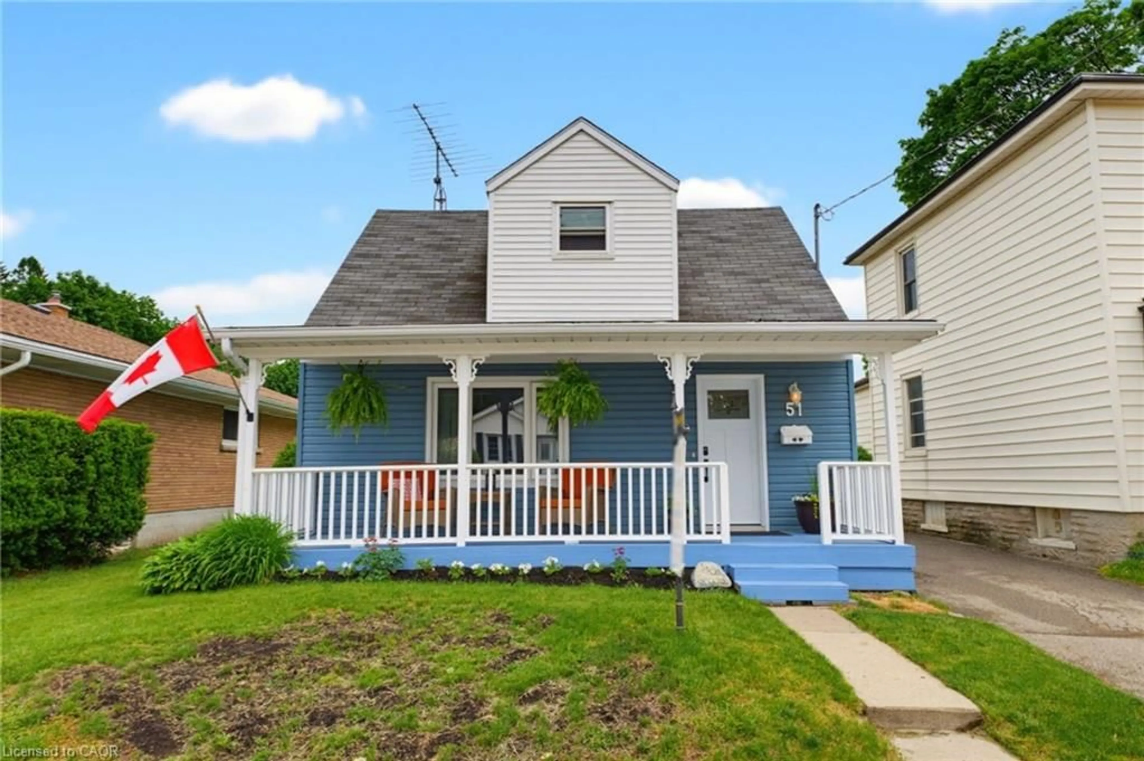Home with vinyl exterior material, street for 51 East St, Cambridge Ontario N1R 4P2