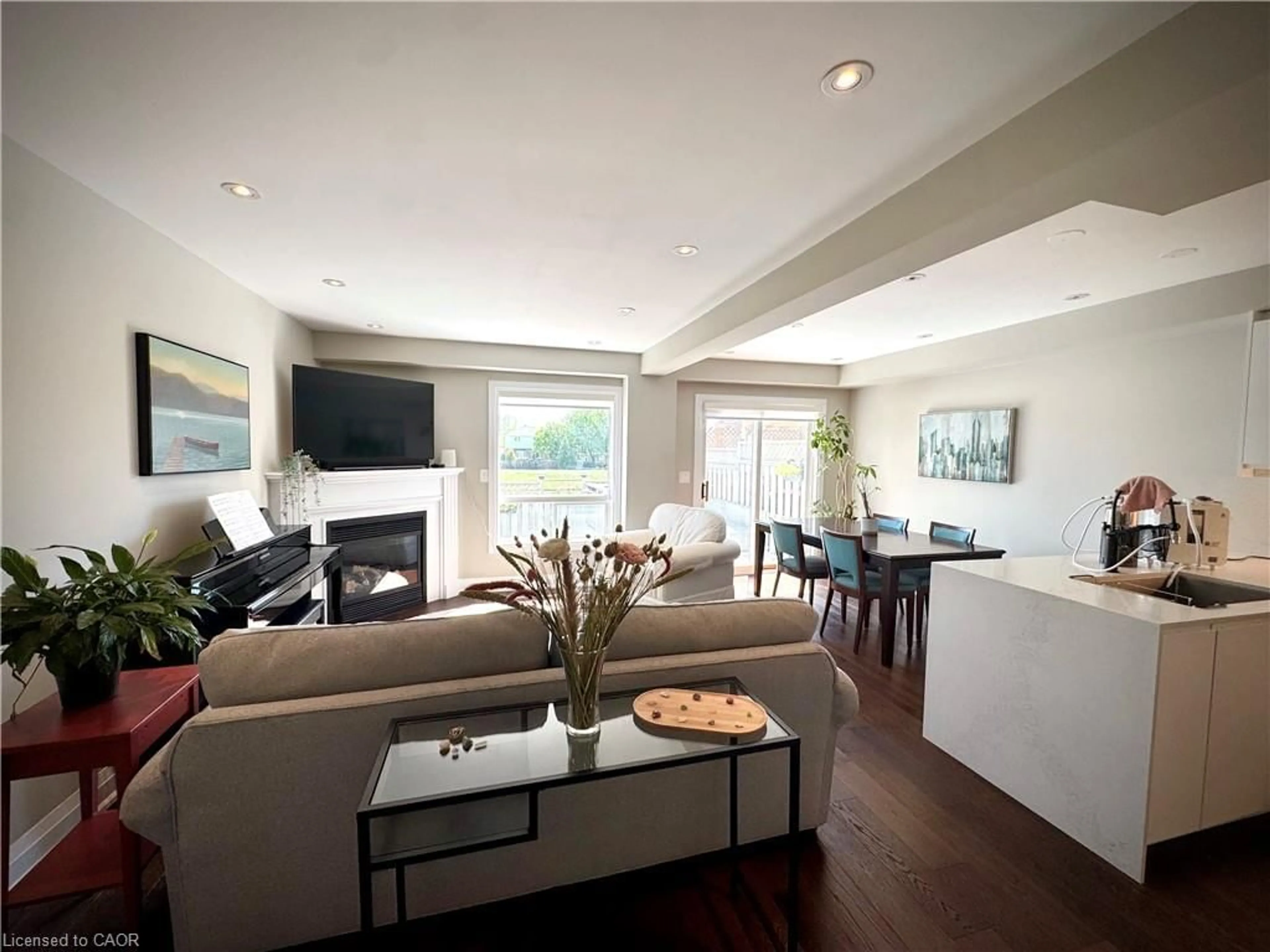 Living room with furniture, wood/laminate floor for 2871 Darien Rd #30, Burlington Ontario L7M 4R6