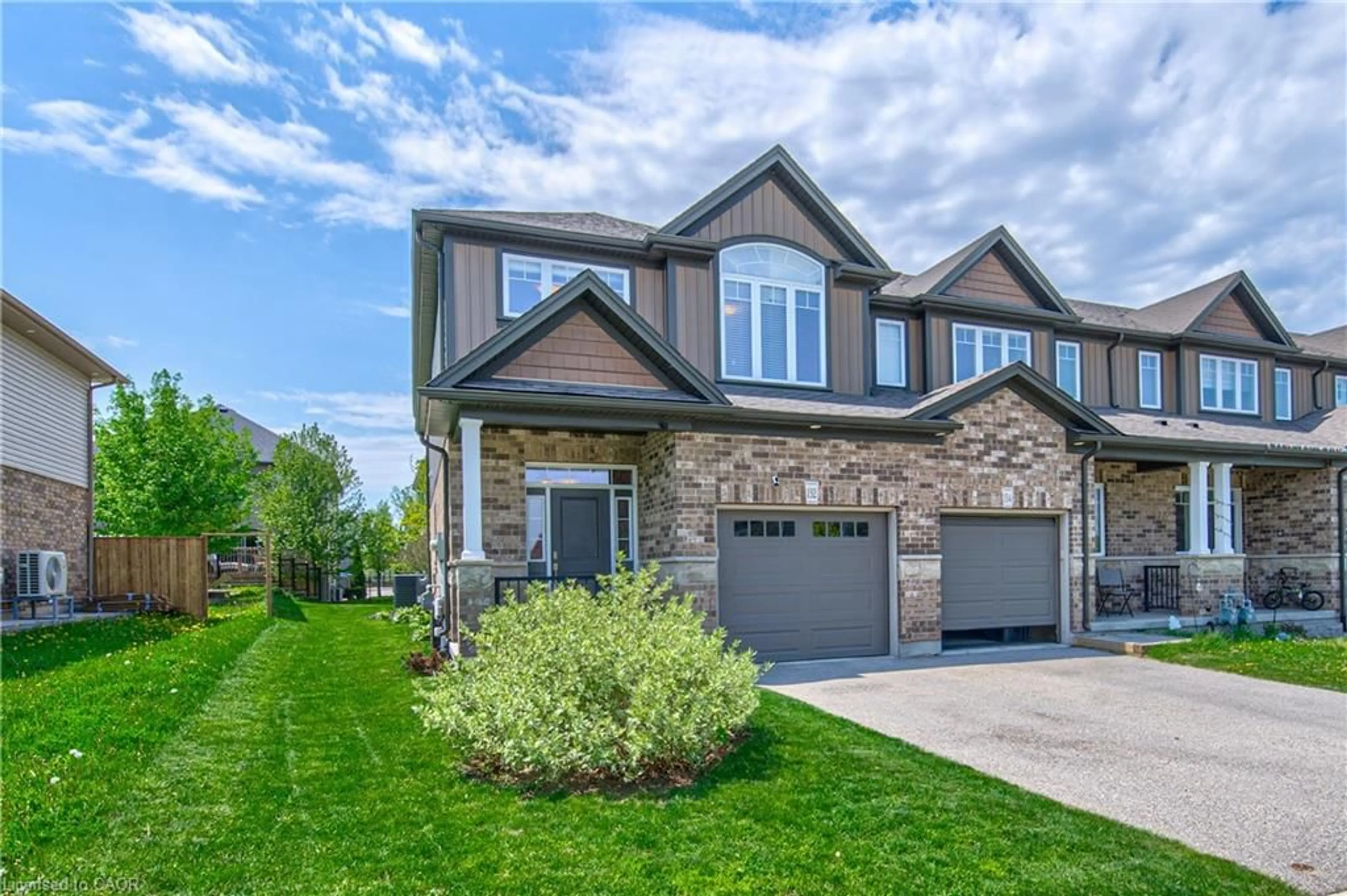 Home with brick exterior material, street for 132 Templewood Dr, Kitchener Ontario N2R 0H5