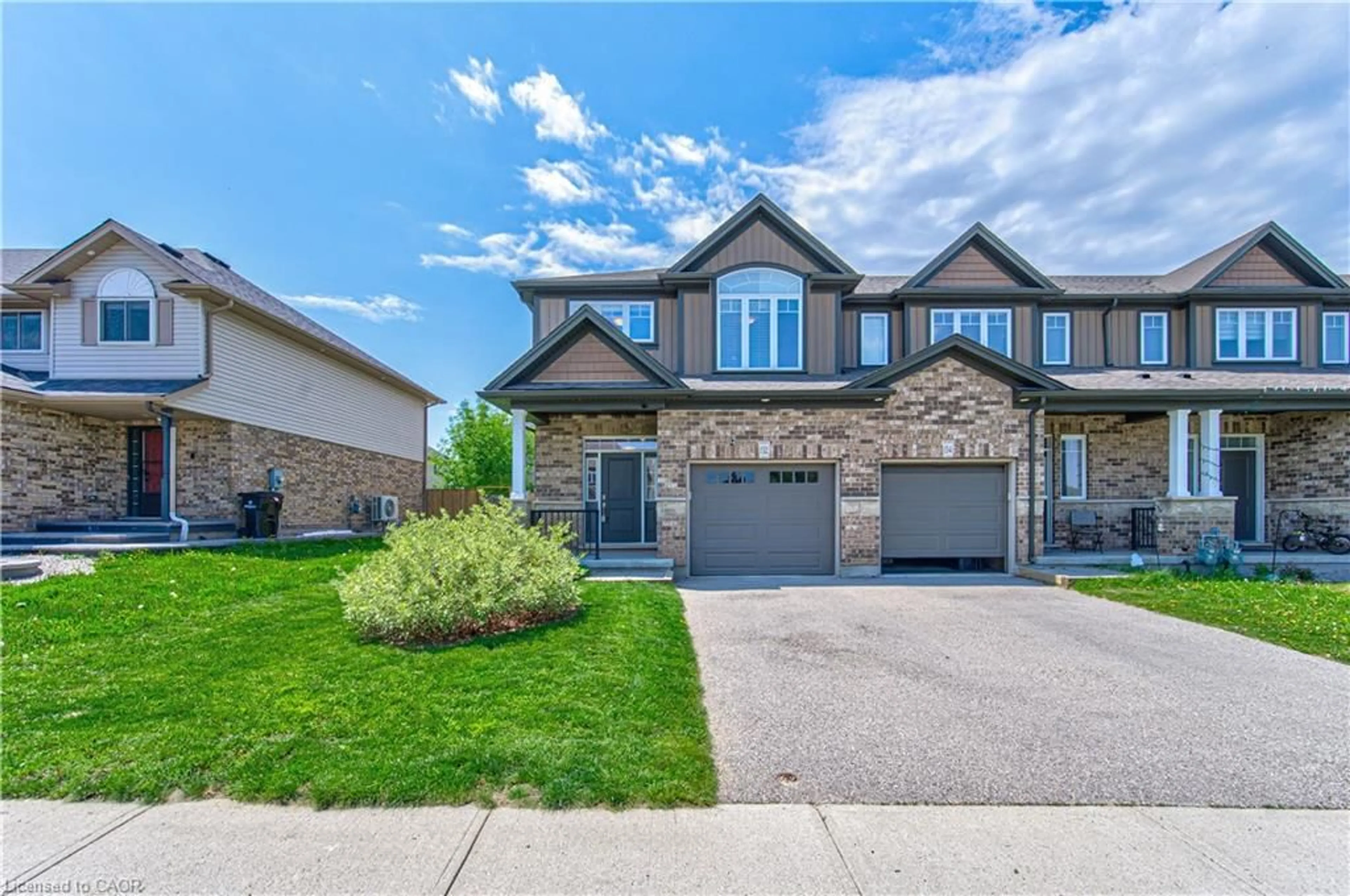 Home with brick exterior material, street for 132 Templewood Dr, Kitchener Ontario N2R 0H5
