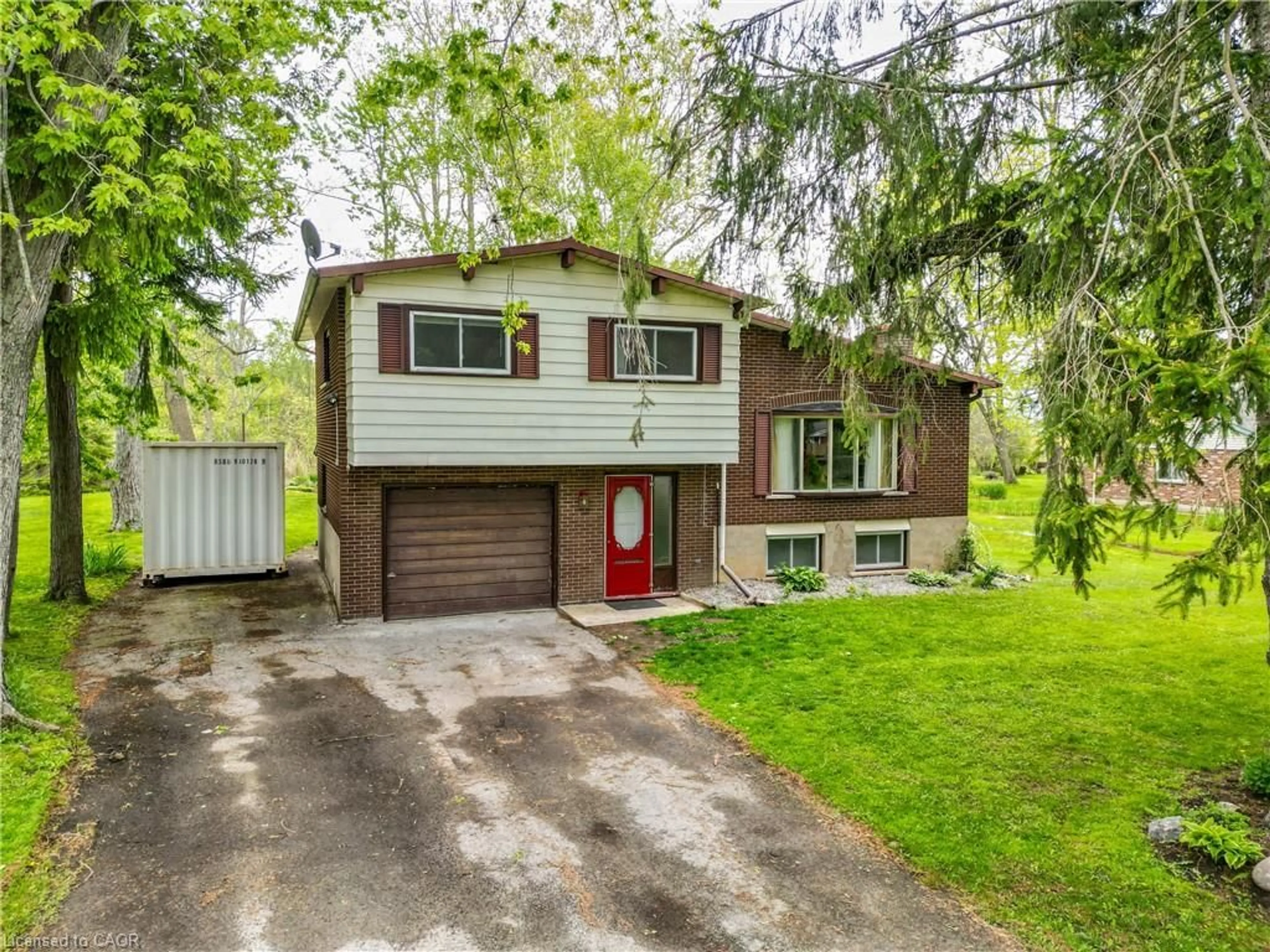 Home with vinyl exterior material, street for 124 Mumby Rd, Dunnville Ontario N1A 2W5