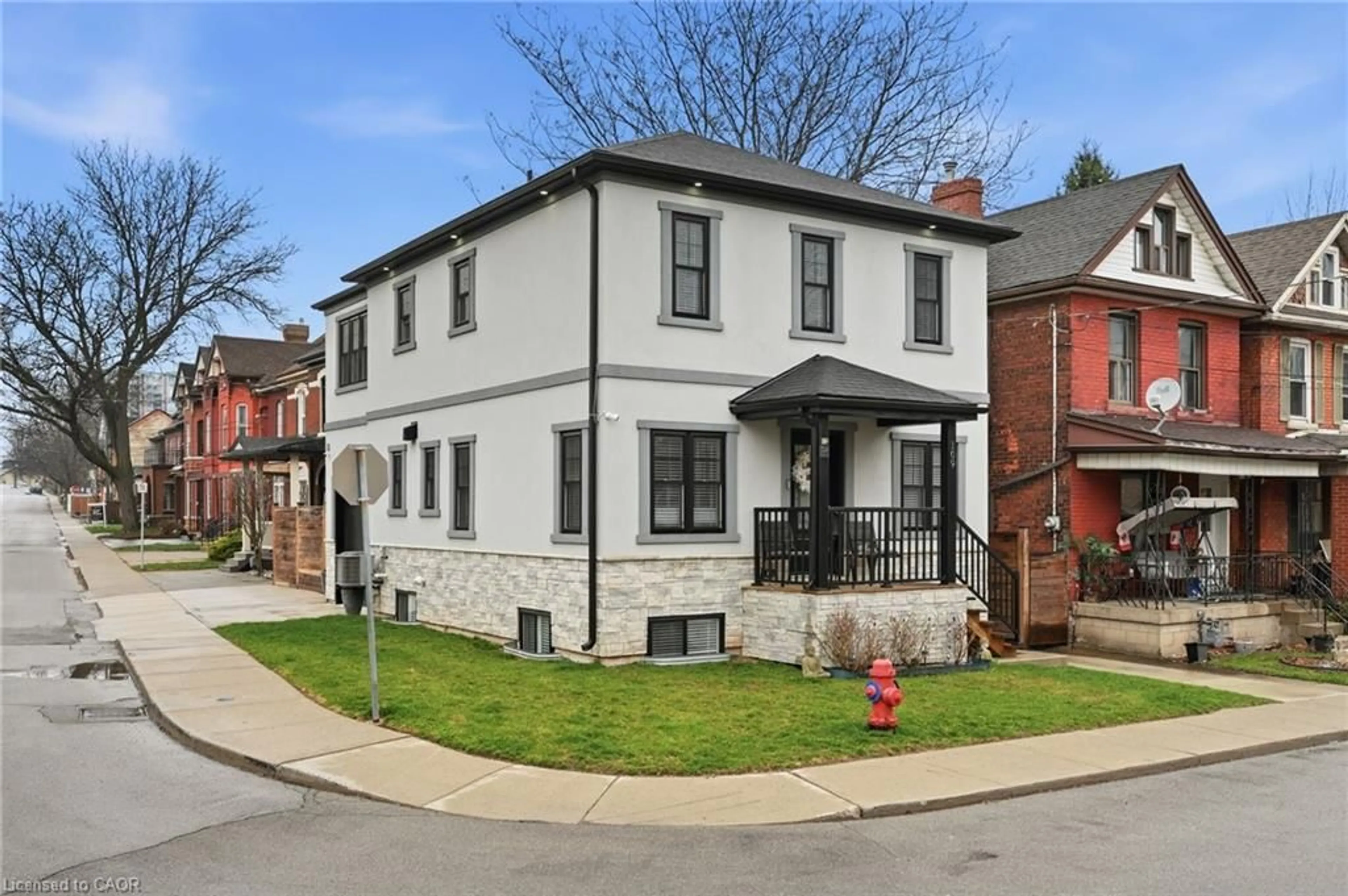 Home with brick exterior material, street for 109 Ray St, Hamilton Ontario L8R 2Y1
