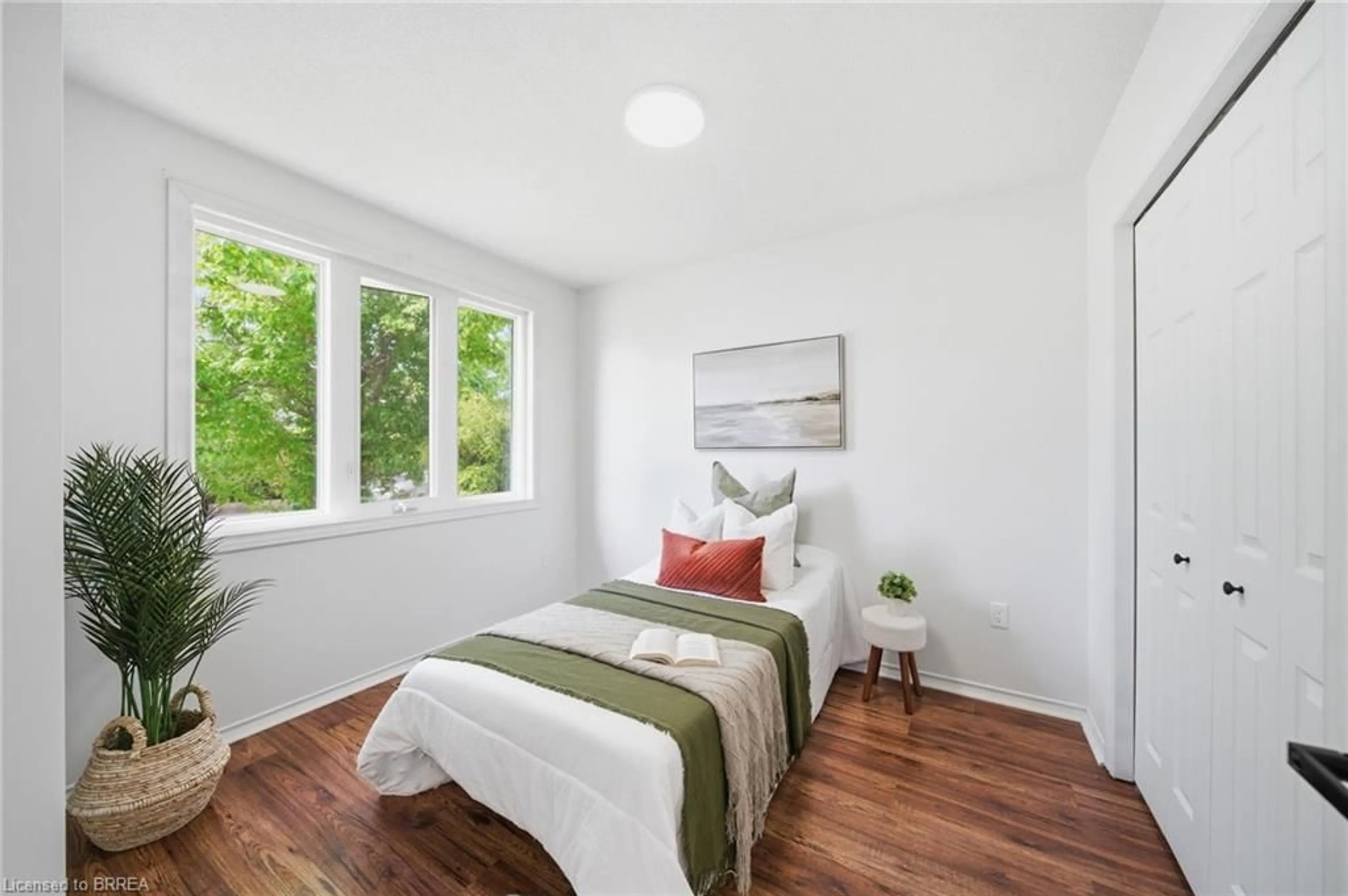Bedroom with bed, wood/laminate floor for 1 Buchanan Cres #10, Brantford Ontario N3P 2B2