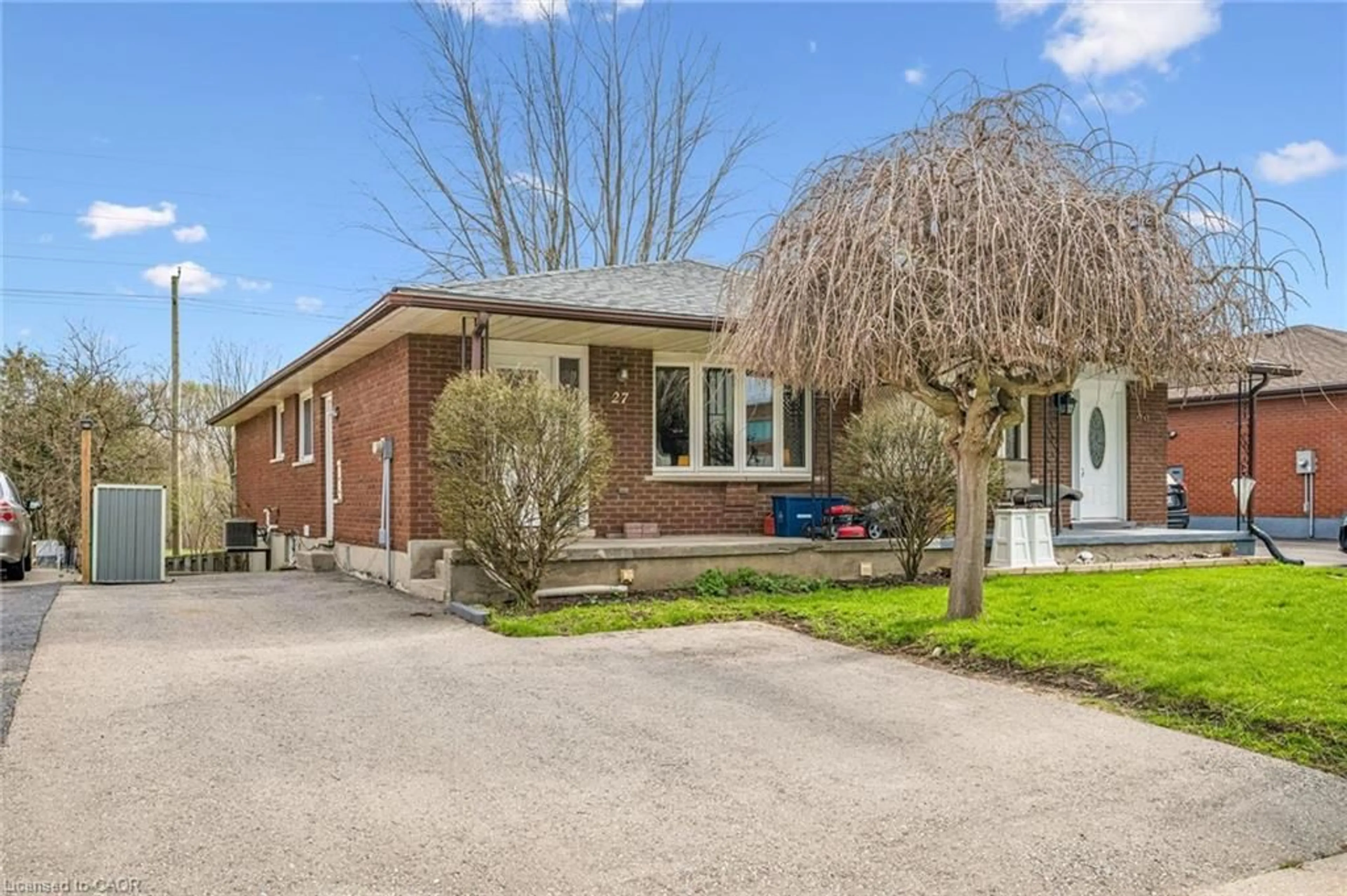 Home with brick exterior material, street for 27 Vicmount Dr, Kitchener Ontario N2M 2A2
