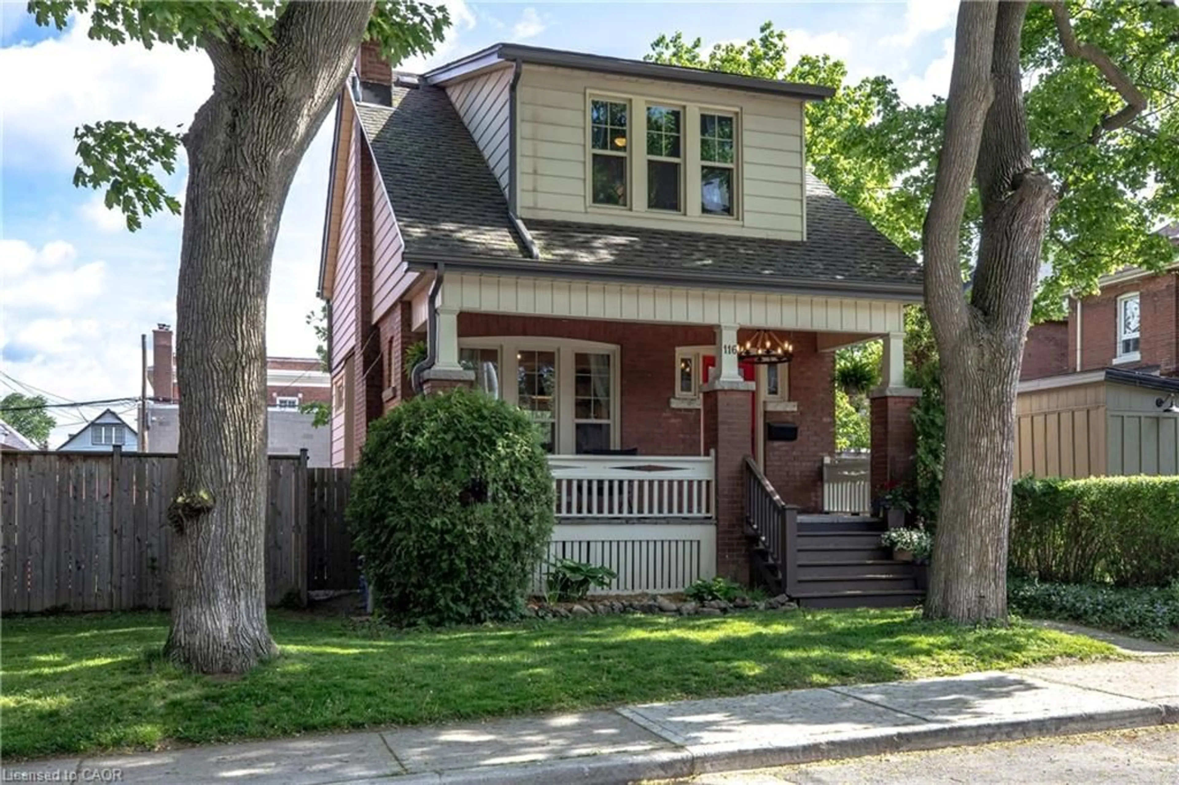 Home with brick exterior material, street for 116 Homewood Ave, Hamilton Ontario L8P 2M5