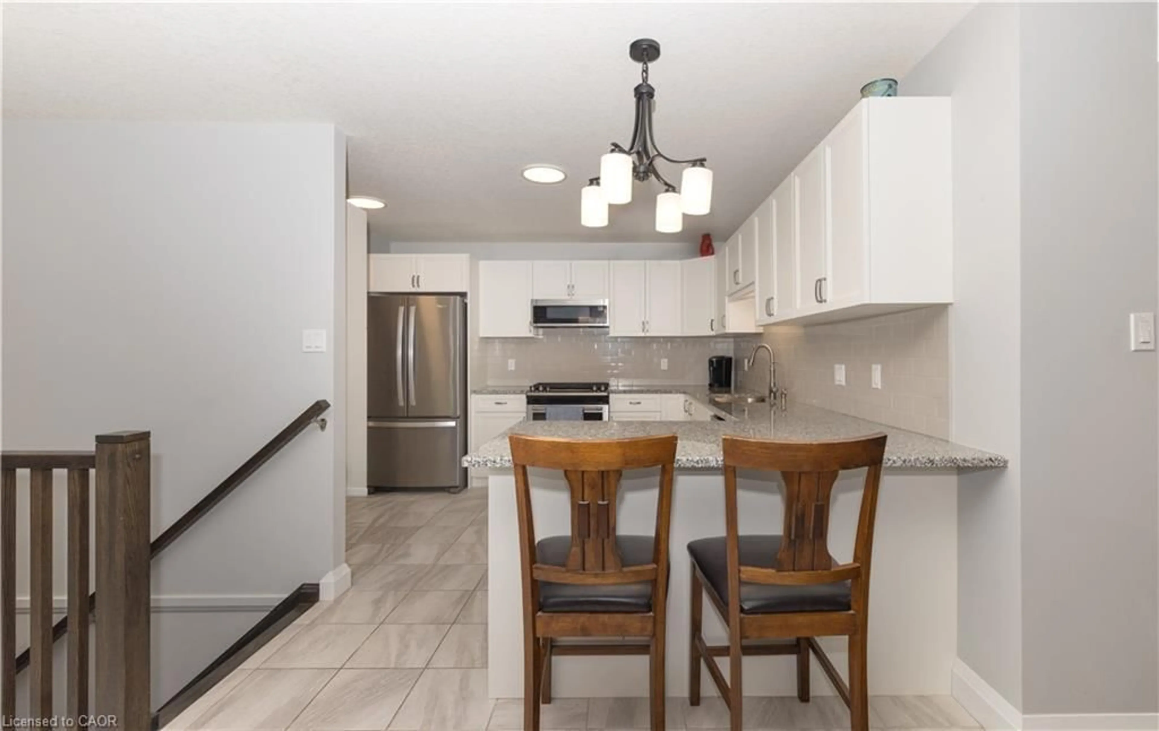 Open concept kitchen, ceramic/tile floor for 108 Stephenson Way, Minto Ontario N0G 2P0