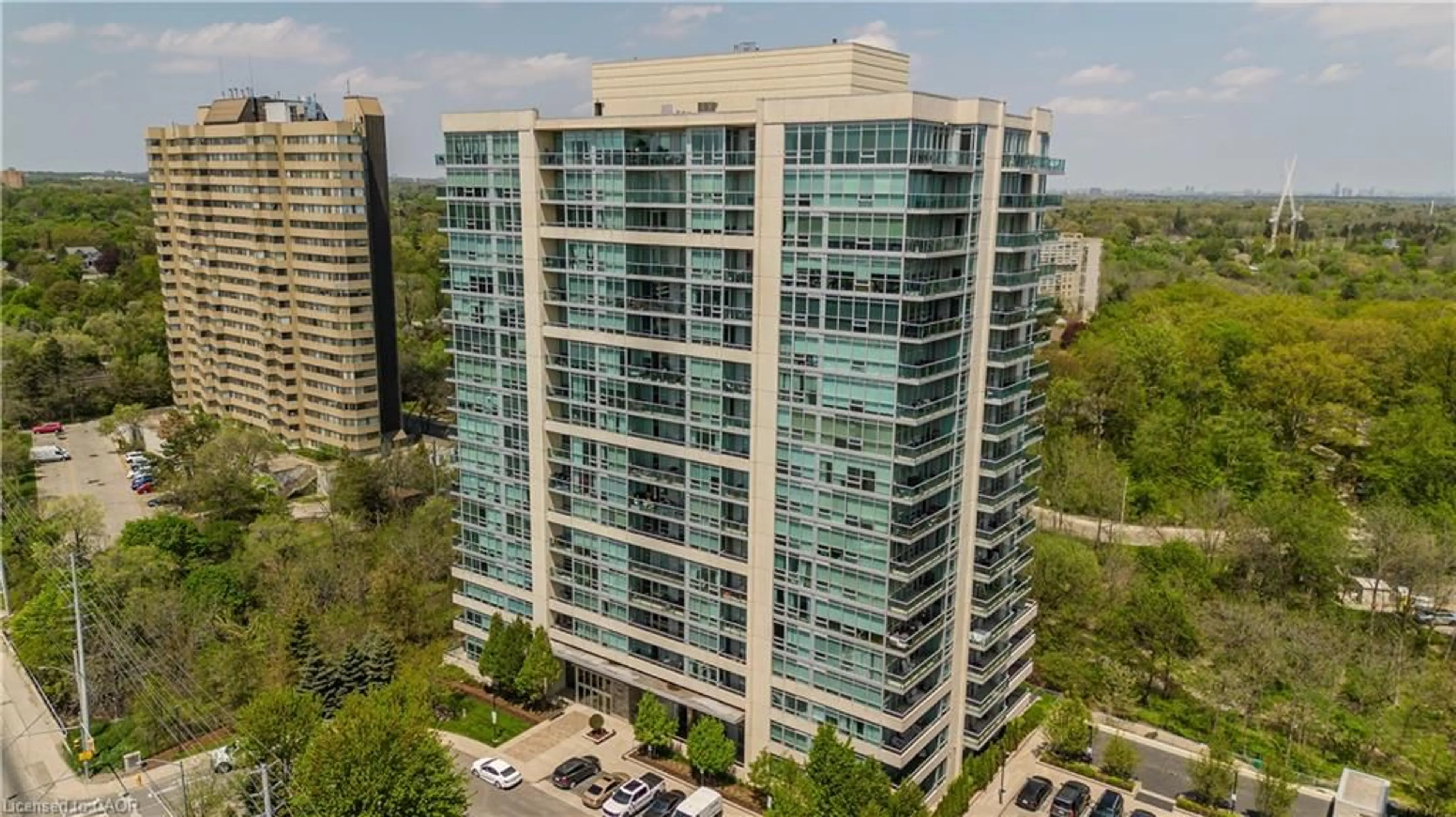 A pic from outside/outdoor area/front of a property/back of a property/a pic from drone, city buildings view from balcony for 1055 Southdown Rd #312, Mississauga Ontario L5J 0A3