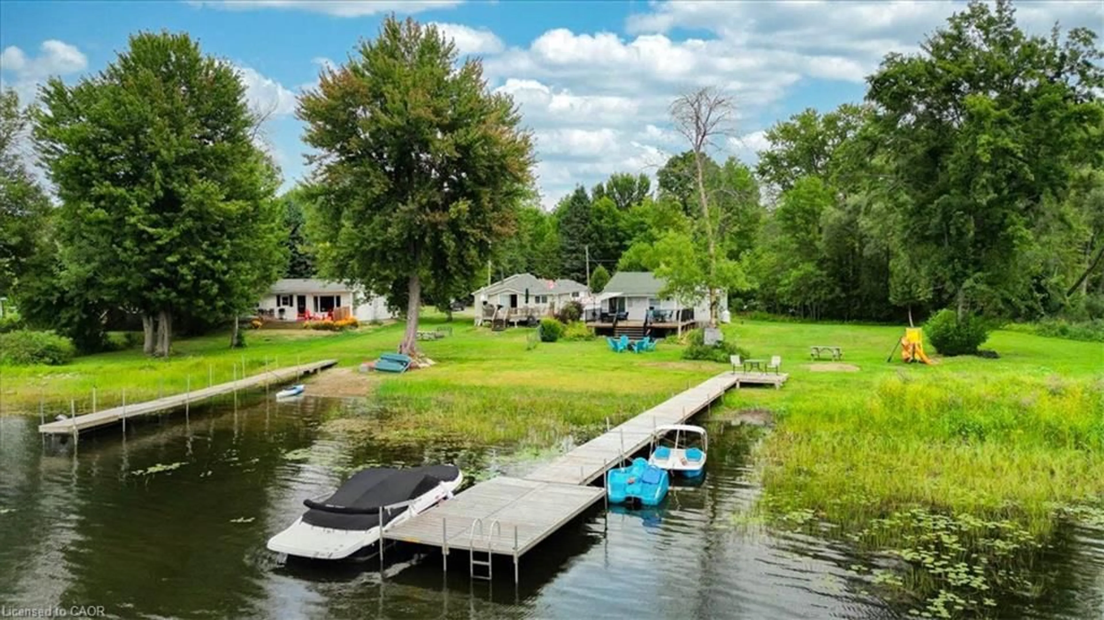 A pic from outside/outdoor area/front of a property/back of a property/a pic from drone, water/lake/river/ocean view for 75 A&B Hughes Lane, Tweed Ontario K0K 3J0
