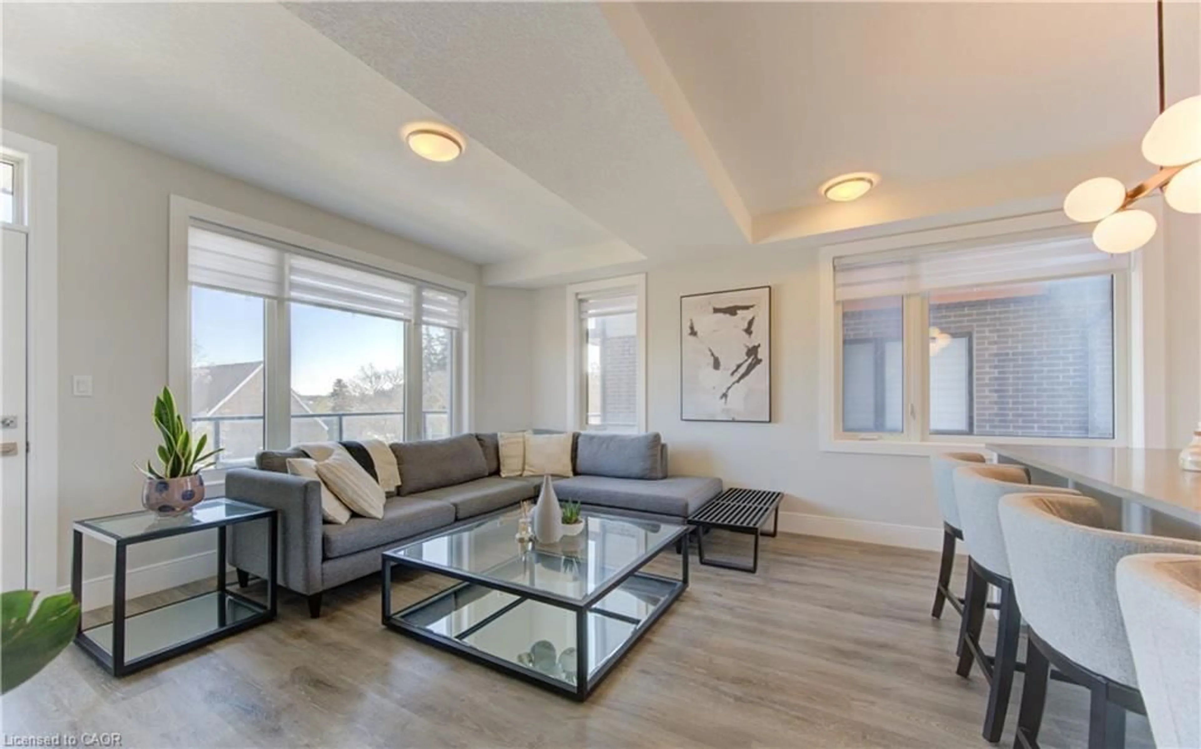 Living room with furniture, wood/laminate floor for 54 Bridge St #23, Kitchener Ontario N2K 0G4